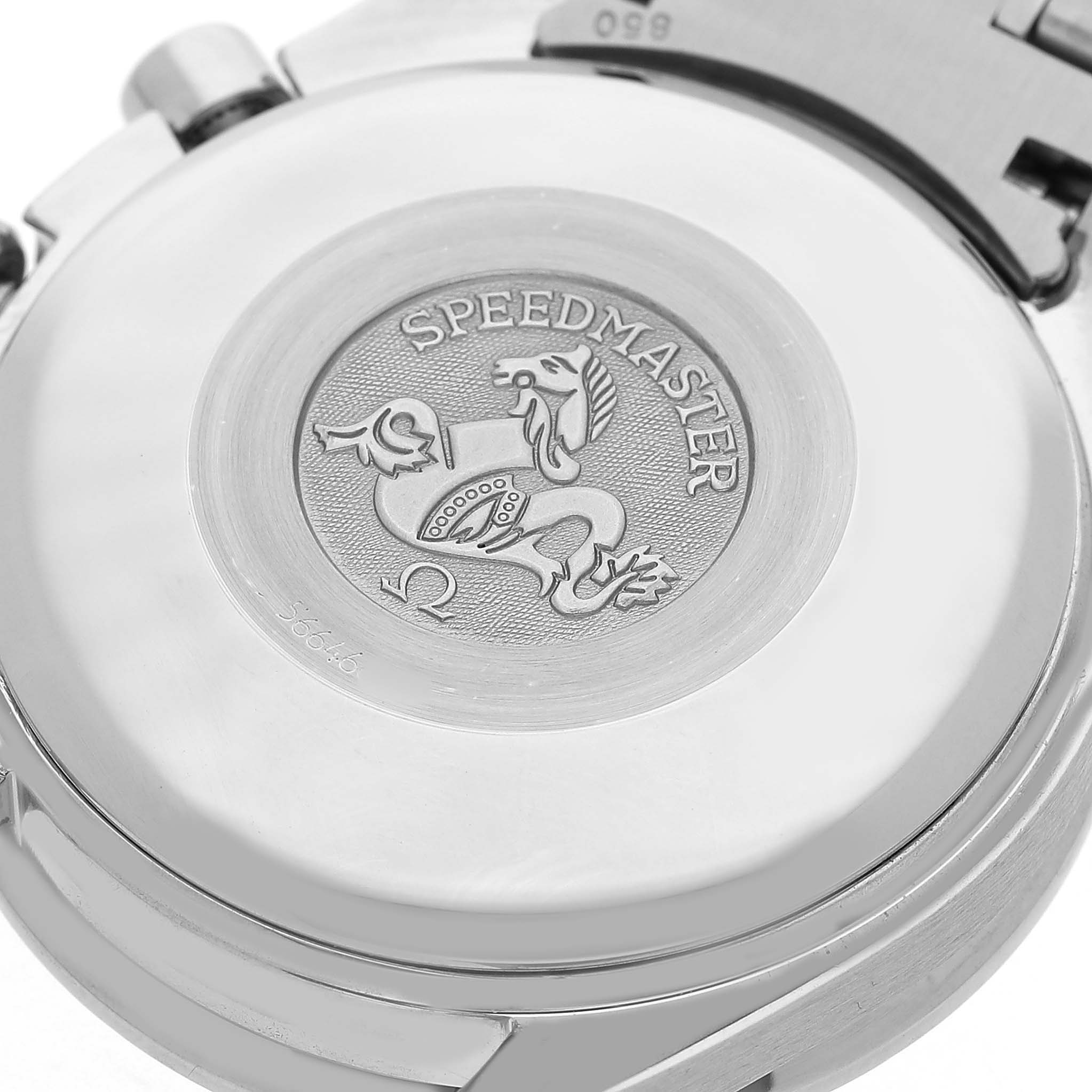 The image shows the back case of the Omega Speedmaster 3523.30.00 Men's Stainless Steel Silver Dial watch, highlighting the engraved logo and text.