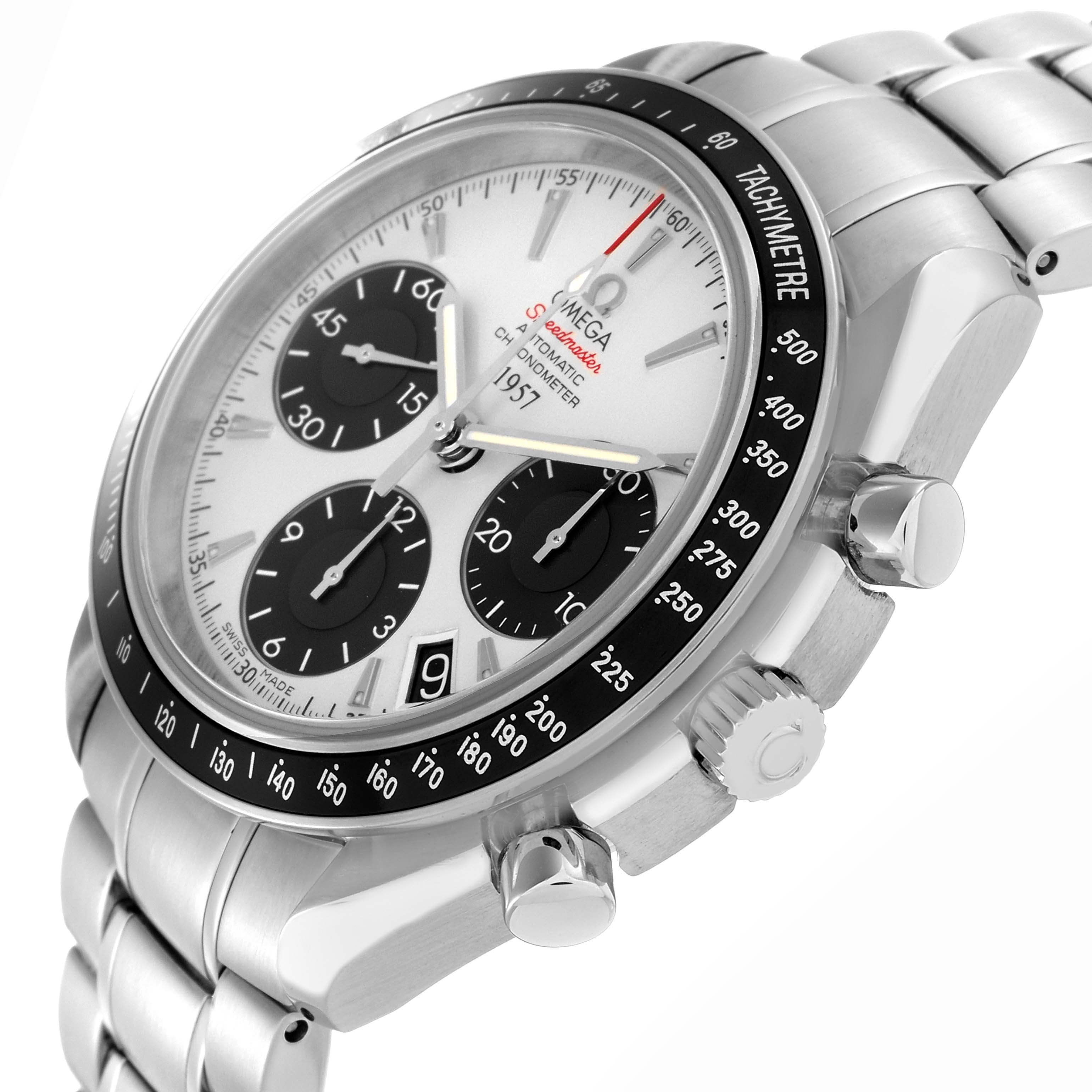The Omega Speedmaster 323.30.40.40.02.001 watch is shown at a side angle, highlighting the tachymeter bezel, crown, pushers, and stainless steel bracelet.