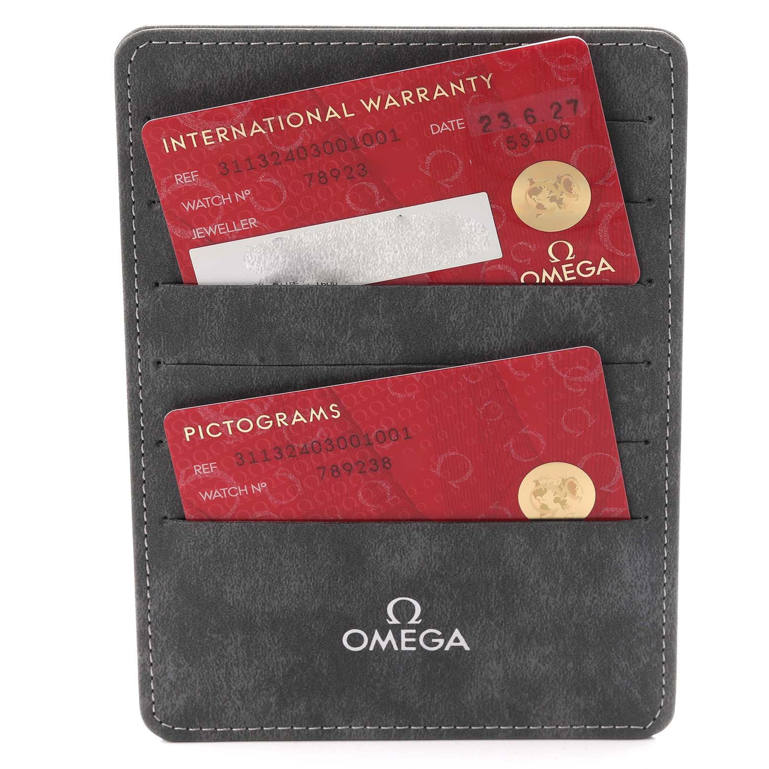 The image shows Omega Speedmaster model 311.32.40.30.01.001 warranty and pictogram cards in a branded cardholder.