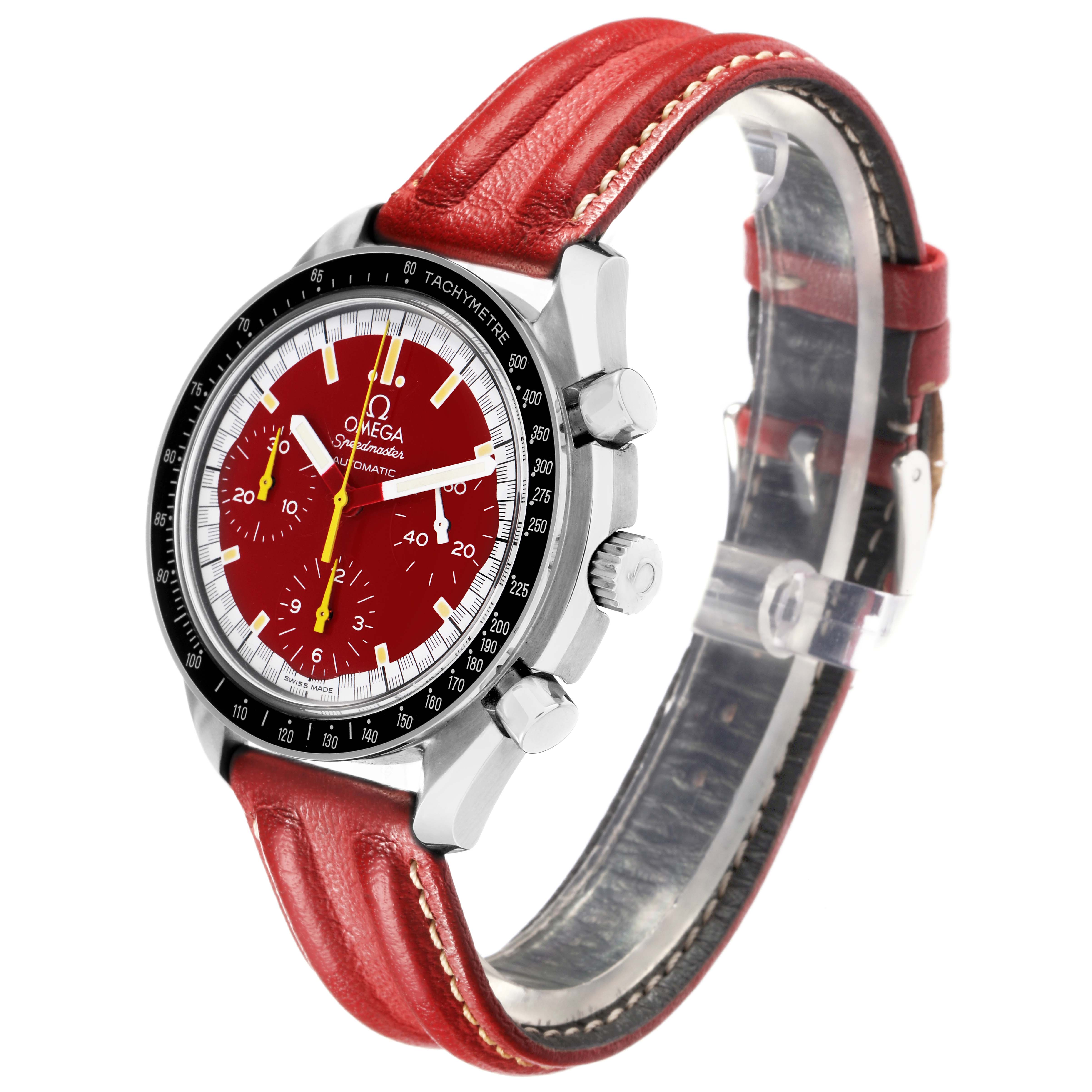 The Omega Speedmaster model 3810.61.41 is displayed from a three-quarter angle, showcasing the red dial, tachymetric bezel, pushers, crown, and red leather strap.