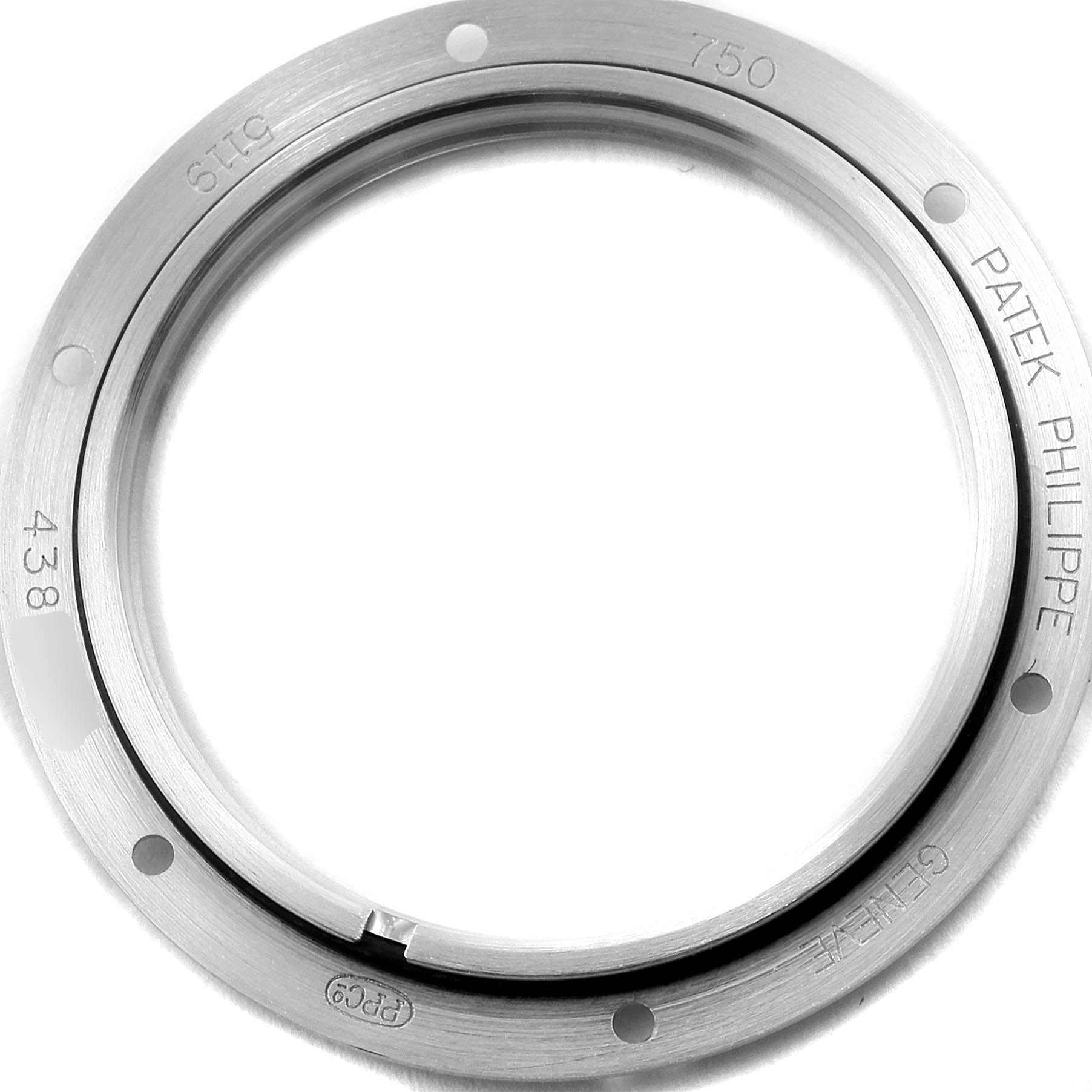 The image shows the bezel of a Patek Philippe Calatrava 5119G Men's White Gold White Dial 5119G Men's White Gold White Dial watch, viewed from a top-down angle.