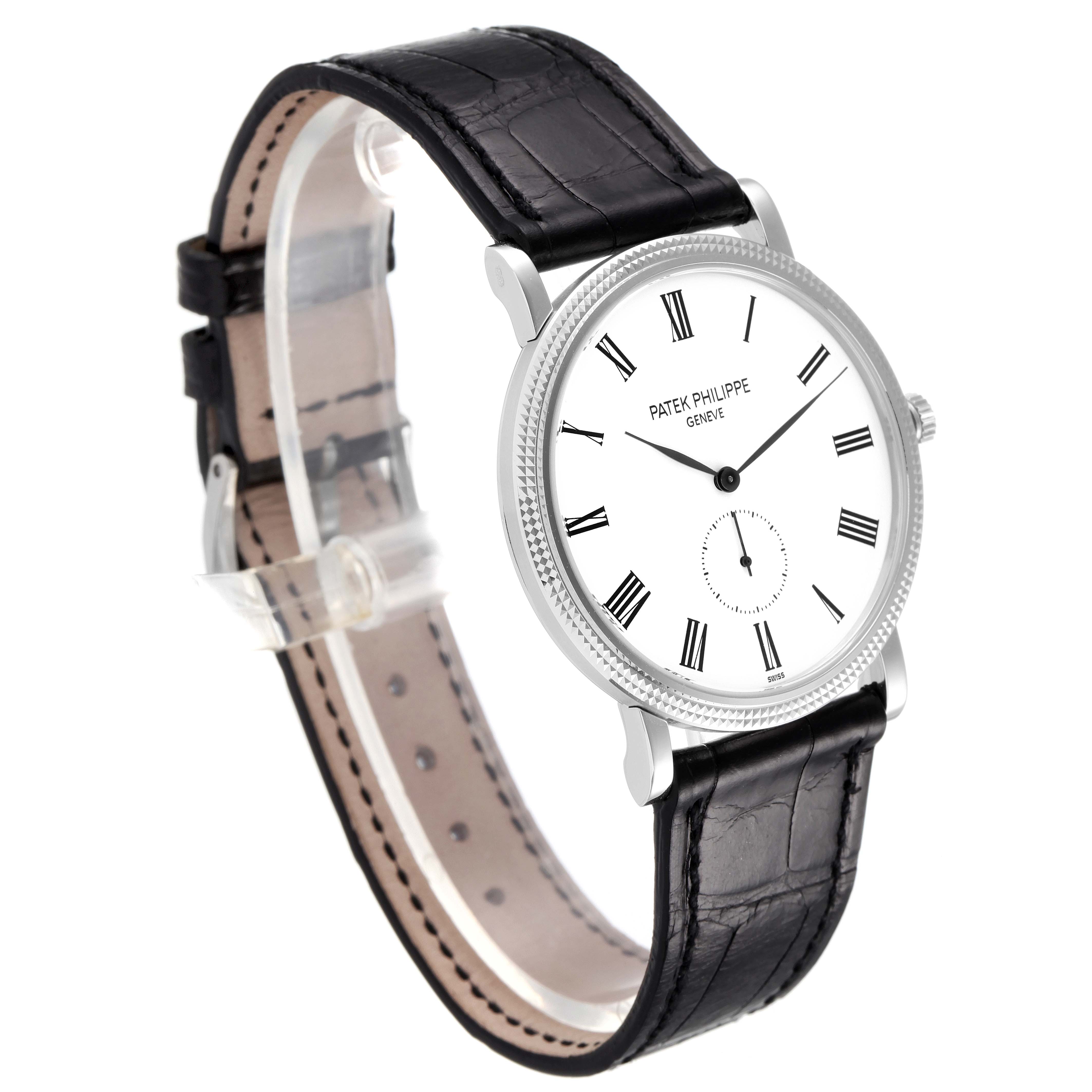 The Patek Philippe Calatrava 5119G Men's White Gold White Dial 5119G Men's White Gold White Dial watch is angled showing the face, crown, case, and black leather strap.