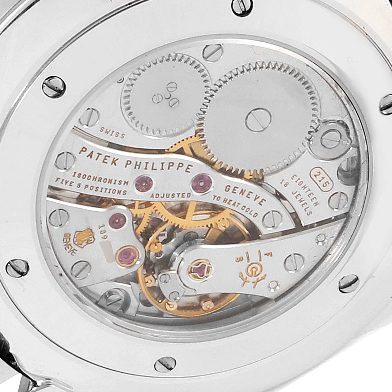 This is a close-up of the back of the Patek Philippe Calatrava 5119G Men's White Gold White Dial 5119G Men's White Gold White Dial watch, showcasing its intricate mechanical movement.