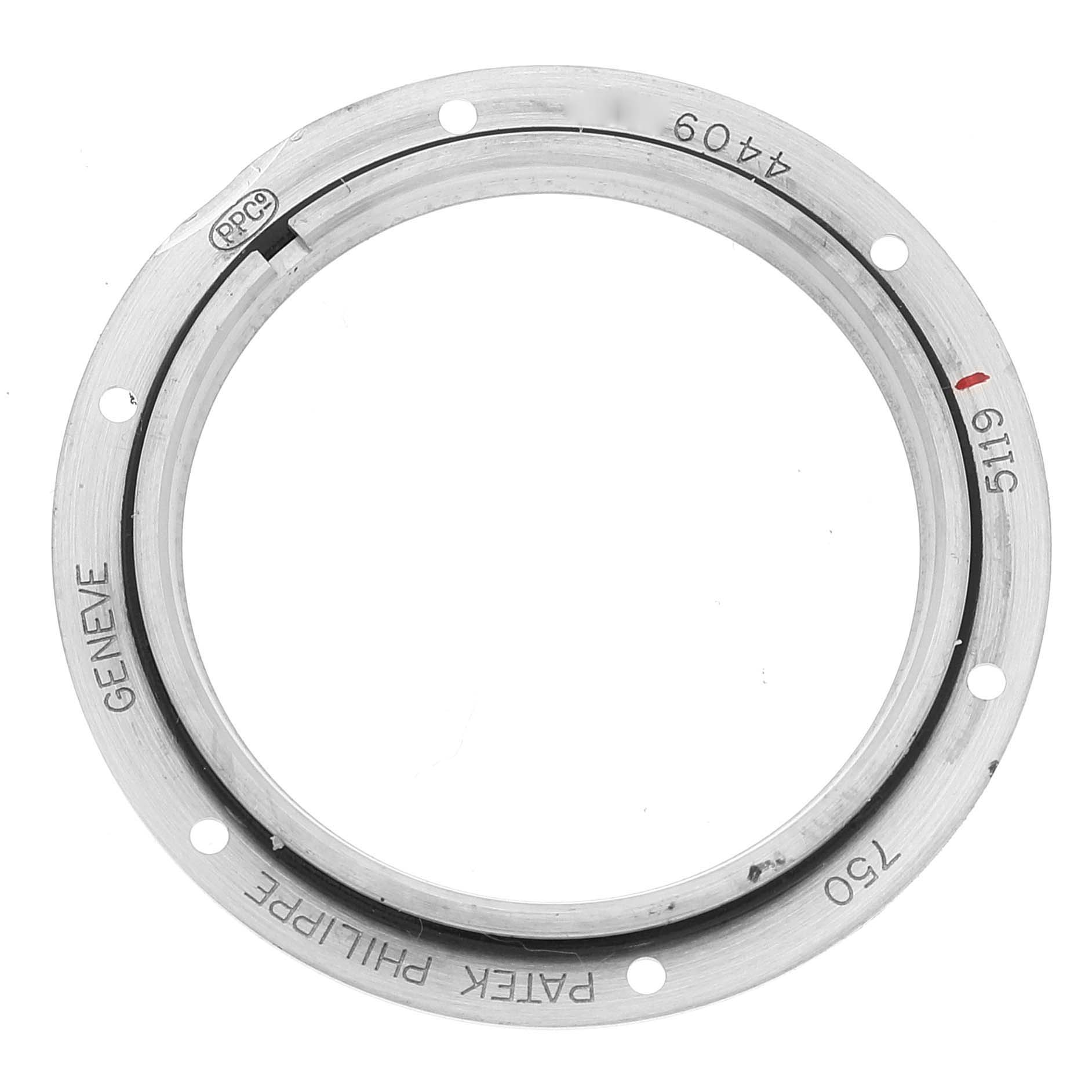 The image shows the bezel of a Patek Philippe Calatrava 5119G Men's White Gold White Dial 5119G Men's White Gold White Dial watch, photographed from a top-down angle.