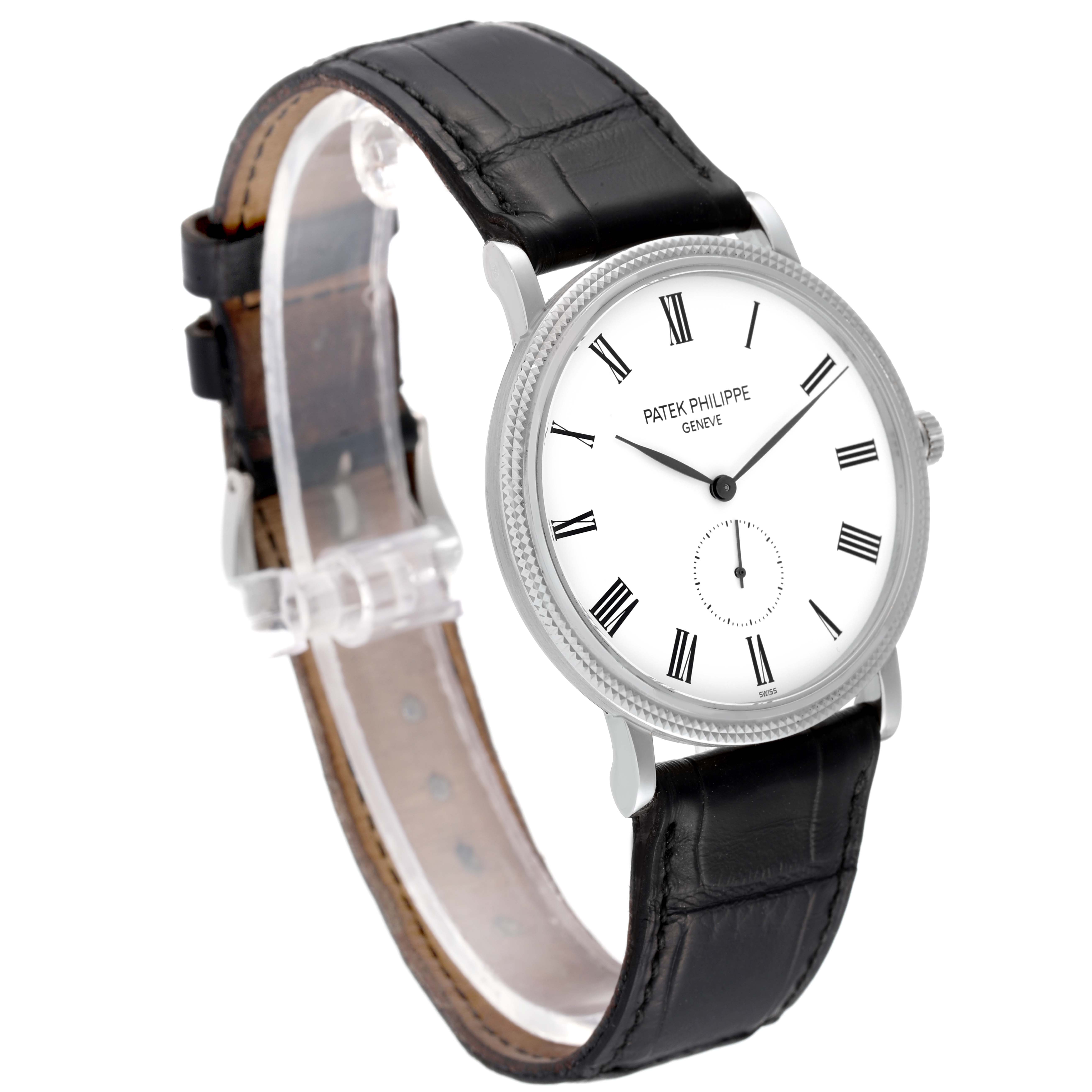 This image shows a Patek Philippe Calatrava 5119G Men's White Gold White Dial 5119G Men's White Gold White Dial watch at an angled side view, highlighting its face, bezel, case, and black leather strap.