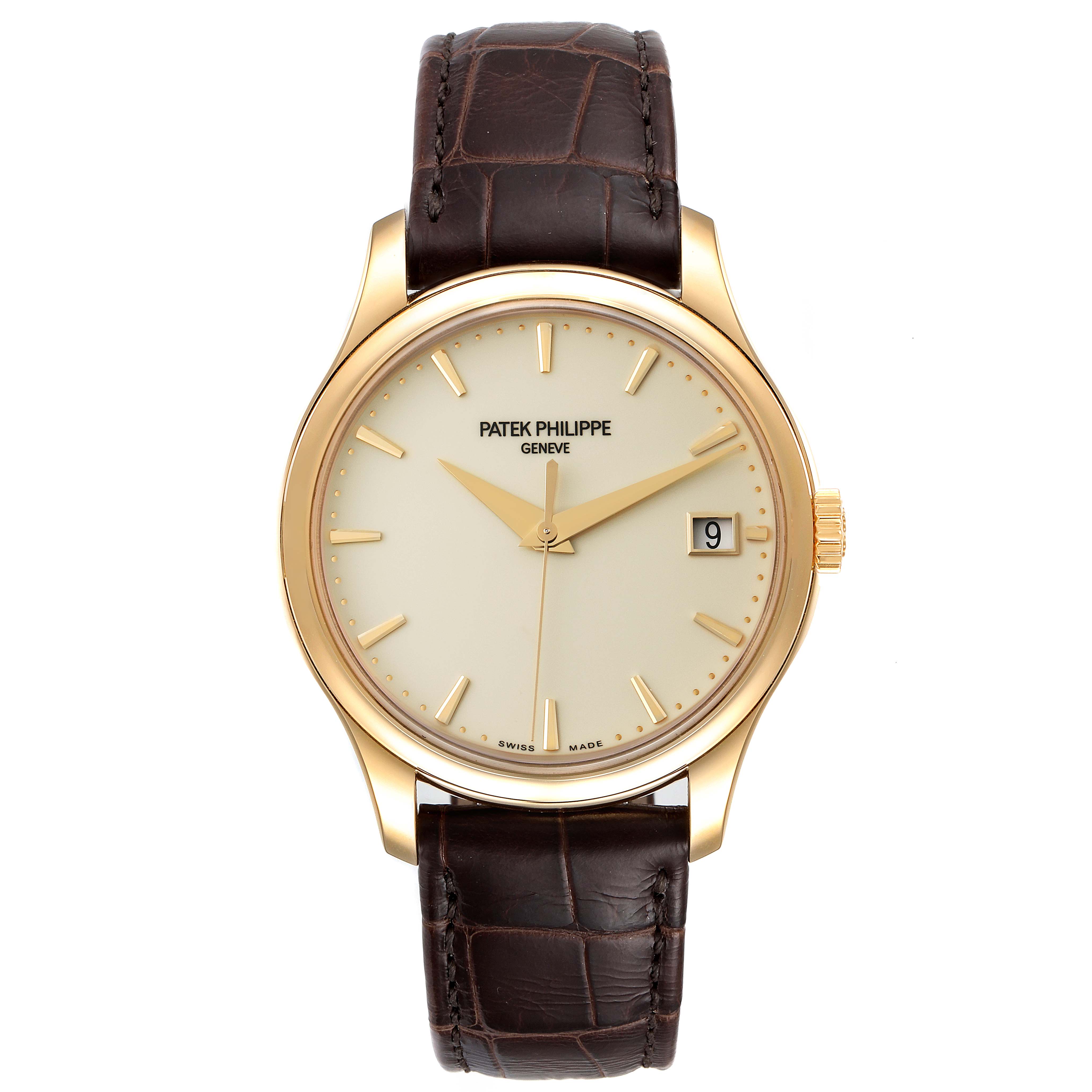 The image shows a front view of a Patek Philippe Calatrava 5227J-001 Men's Yellow Gold Beige Dial 5227J-001 Men's Yellow Gold Beige Dial watch with a gold case, brown leather strap, and date display.