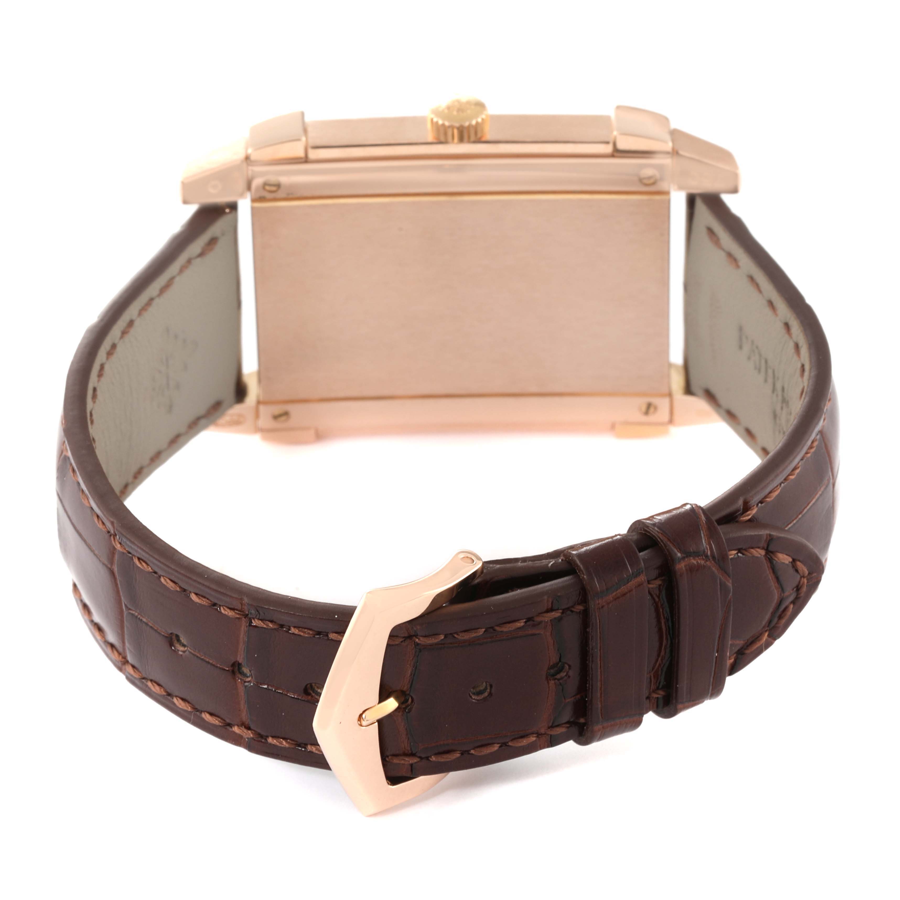 The image shows the back view of a Patek Philippe Gondolo 5111R Men's Rose Gold Silver Dial 5111R Men's Rose Gold Silver Dial watch, featuring its leather strap and case back.