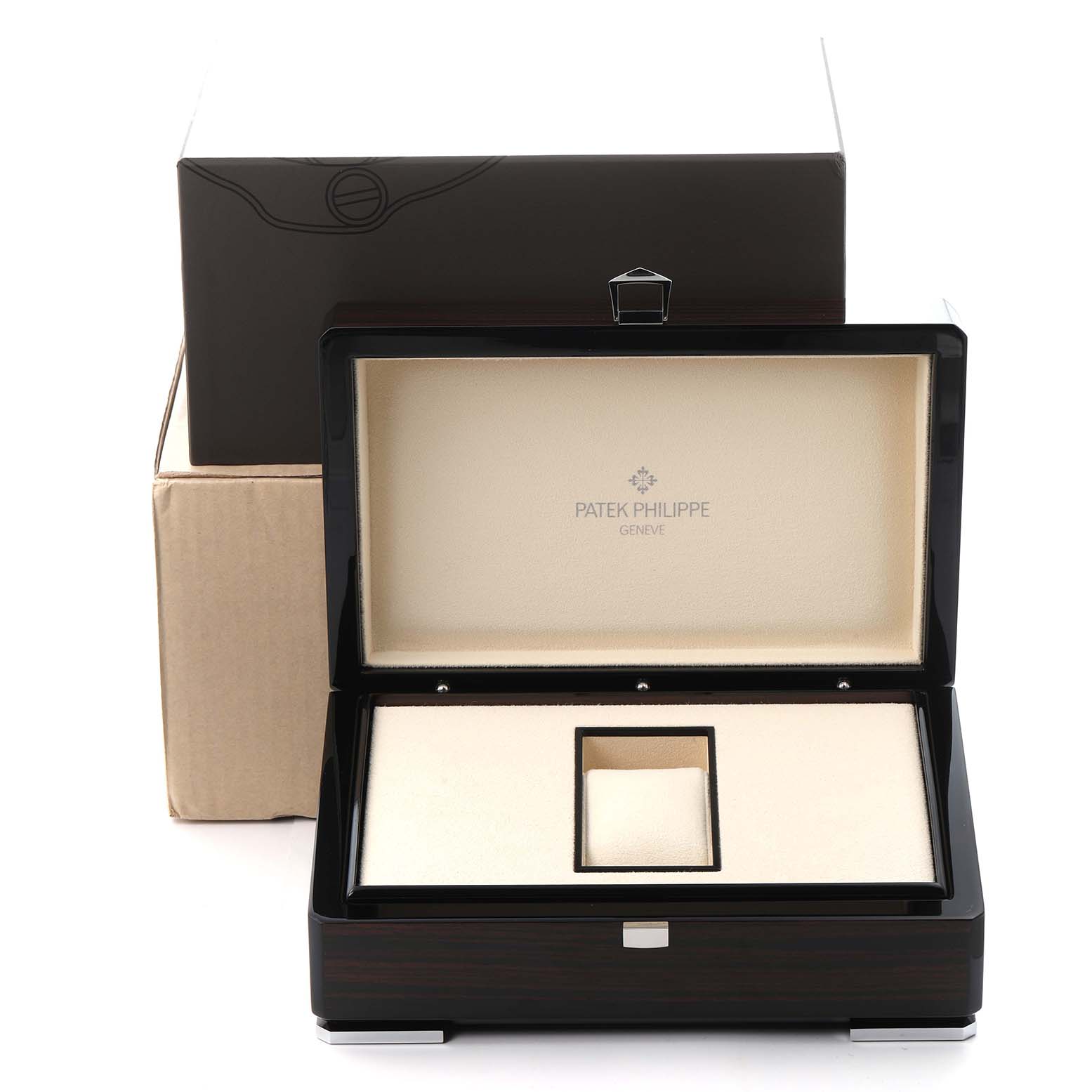 The image shows an open presentation box for a Patek Philippe Complications model 5110J-001 men's watch, displaying its interior compartments.