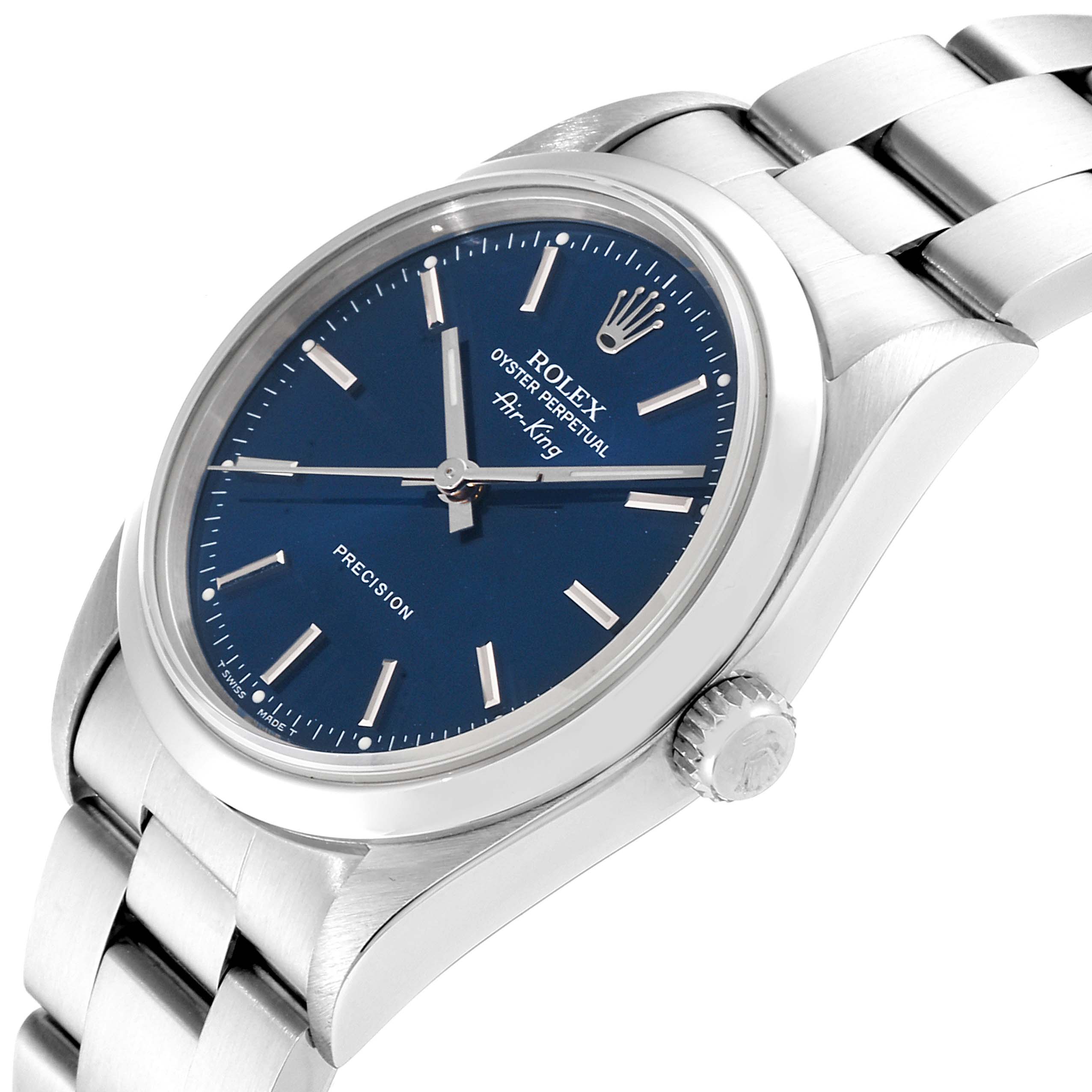 The image shows a side angle of the Rolex Air-King 14000M Men's Stainless Steel Blue Dial 14000M Men's Stainless Steel Blue Dial watch, highlighting the blue dial, crown, and a portion of the bracelet.
