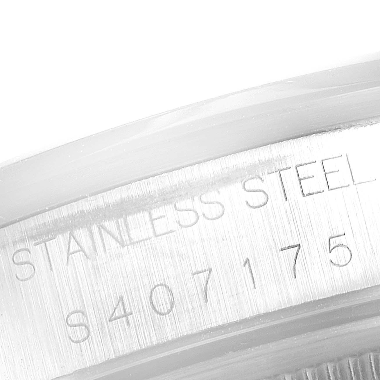 The image shows a close-up of the stainless steel case back with engravings of the Rolex Air-King 14000M Men's Stainless Steel Blue Dial 14000M Men's Stainless Steel Blue Dial model.