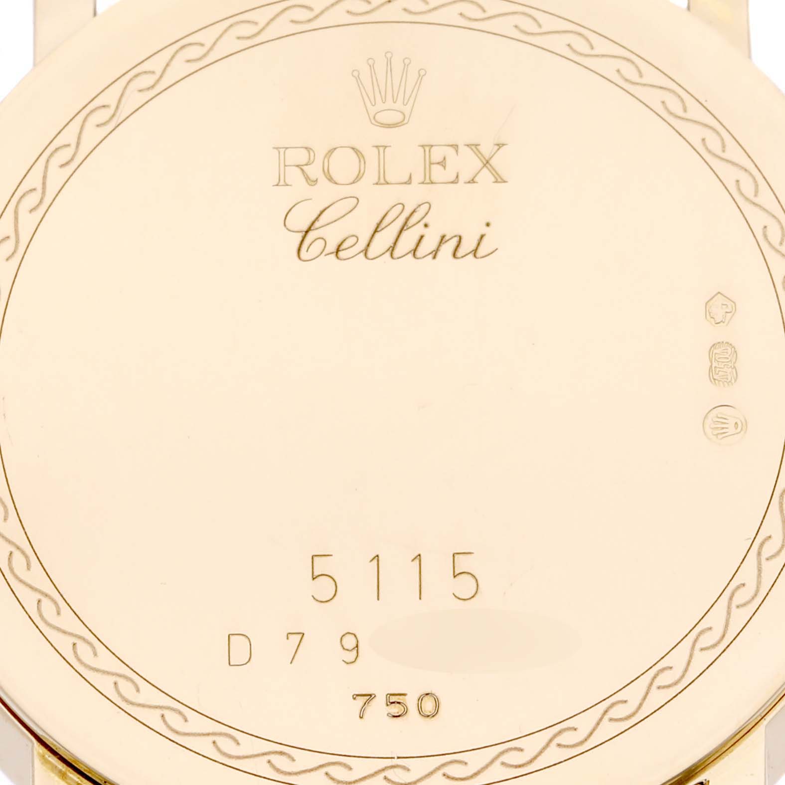 This image shows the back case of a Rolex Cellini 5115 Men's Yellow Gold Champagne Dial 5115 Men's Yellow Gold Champagne Dial watch, featuring the model number and engravings.