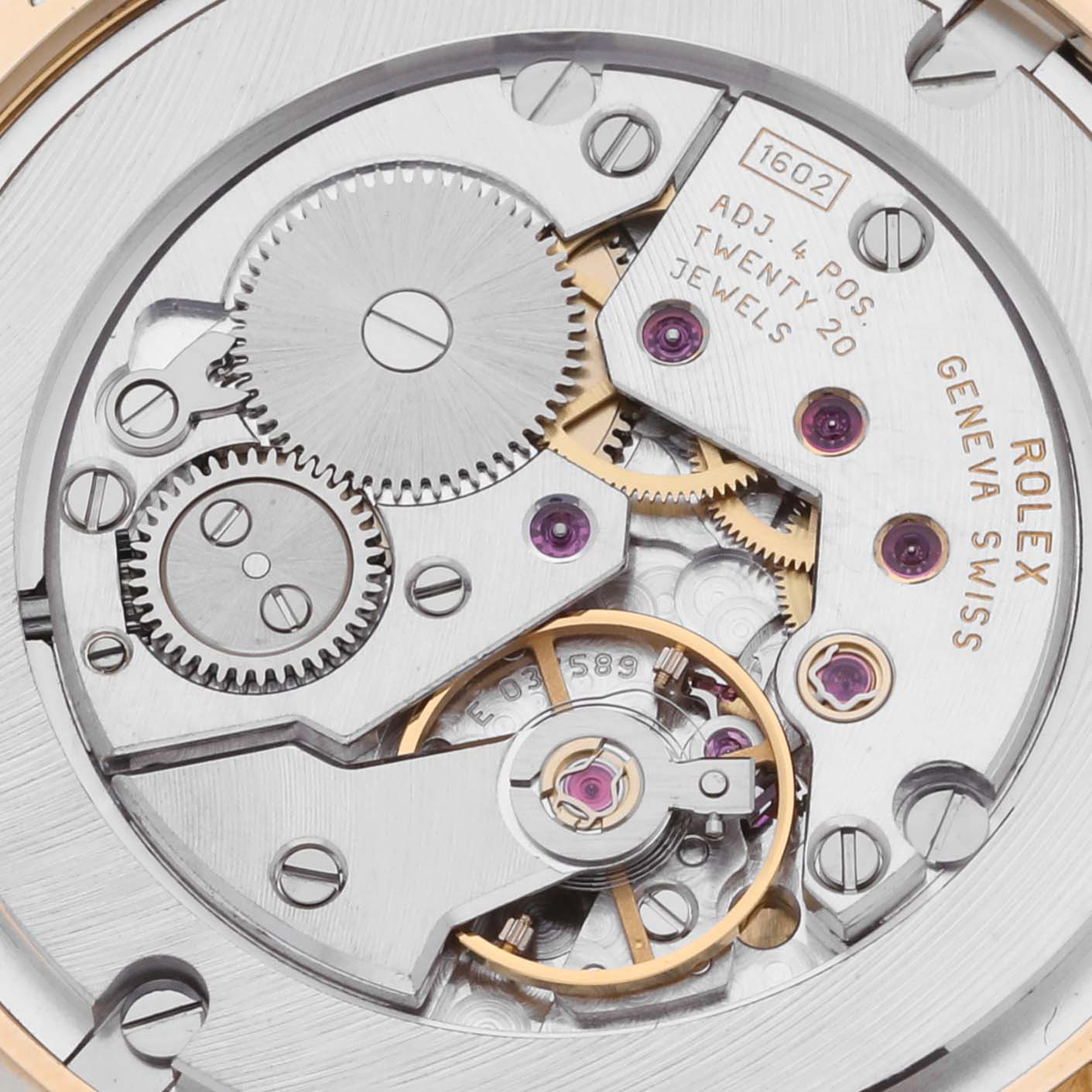 This image shows a close-up view of the Rolex Cellini 5115 Men's Yellow Gold Champagne Dial 5115 Men's Yellow Gold Champagne Dial watch movement, featuring gears and jewels.