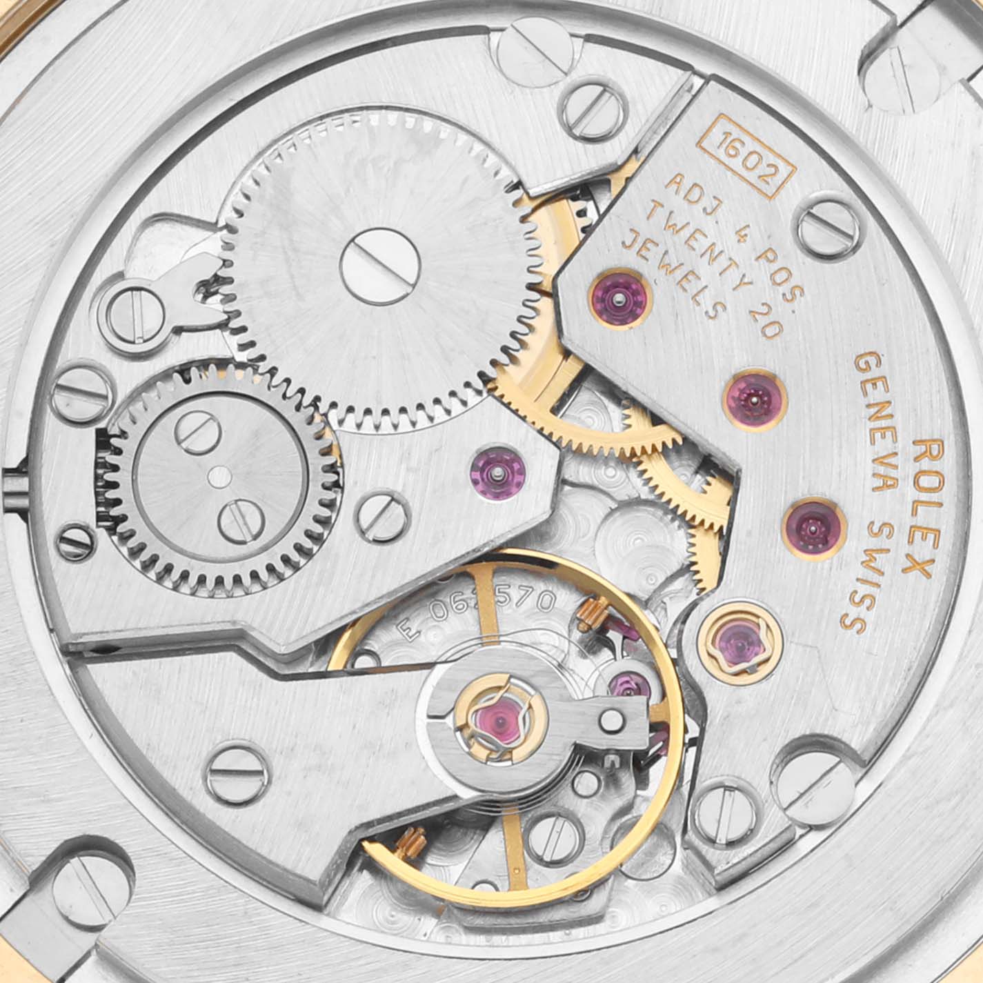 The image shows a close-up view of the Rolex Cellini 5115 Men's Yellow Gold Beige Dial 5115 Men's Yellow Gold Beige Dial watch's movement, highlighting its gears, jewels, and intricate mechanics.