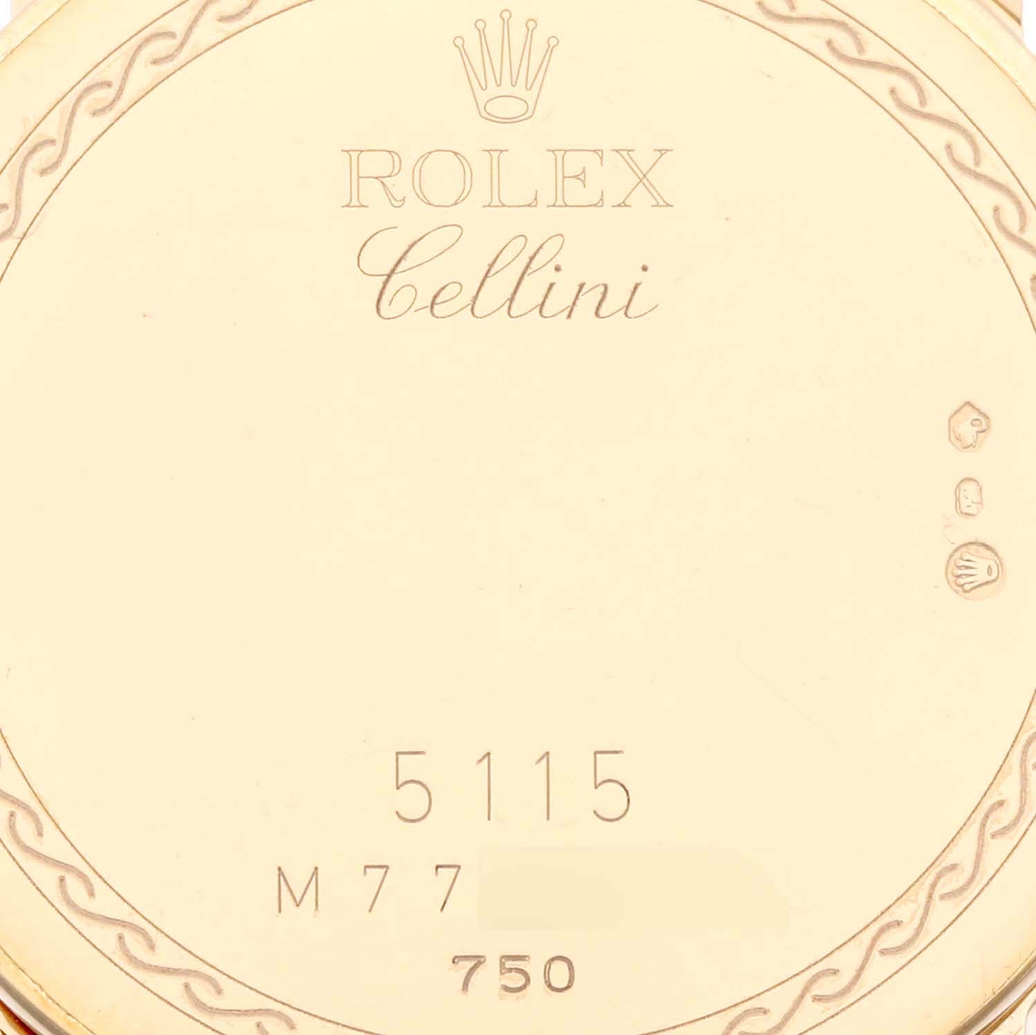The image shows the back case of a Rolex Cellini 5115 Men's Yellow Gold Beige Dial 5115 Men's Yellow Gold Beige Dial watch model 5115, displaying brand inscriptions and hallmarks.