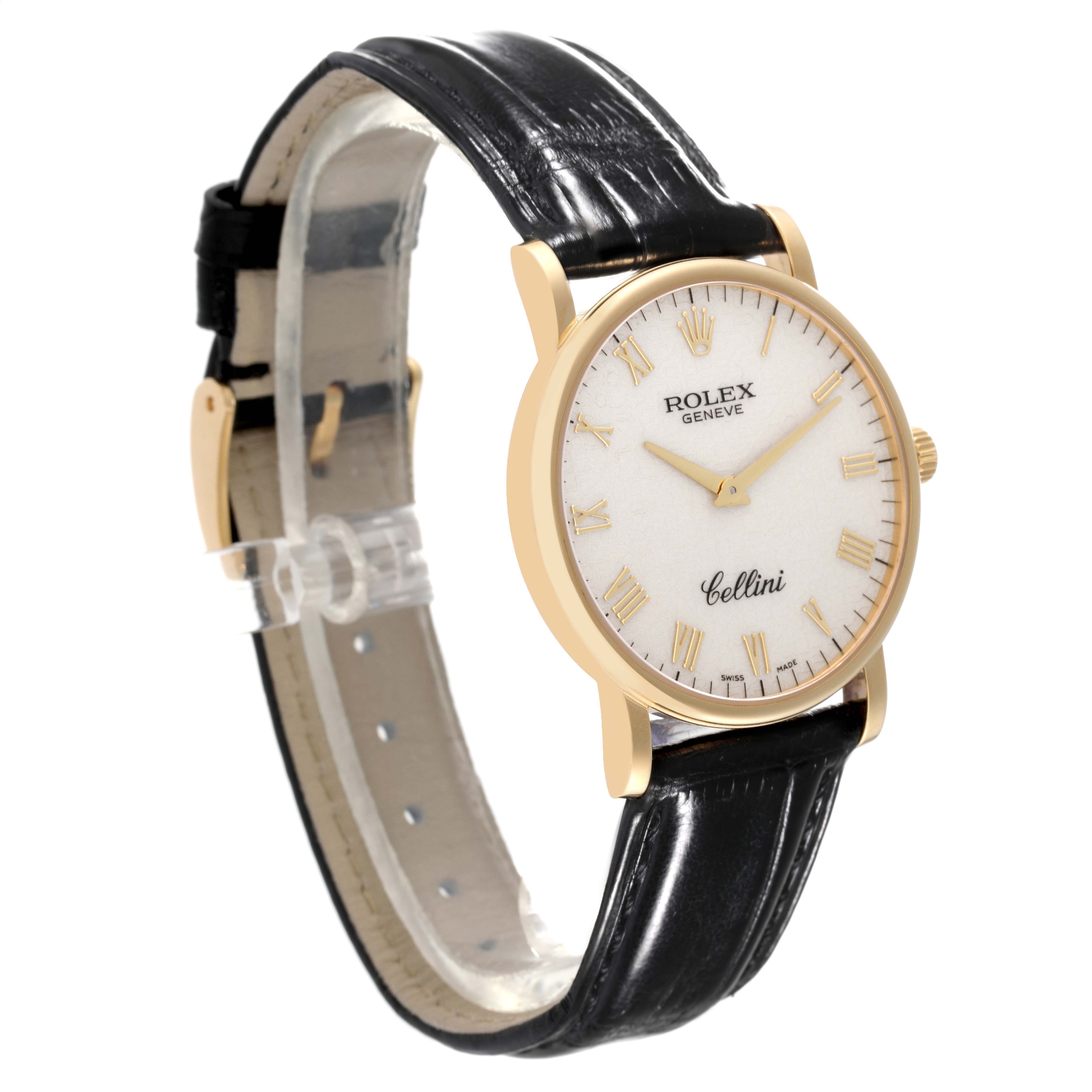 The image shows a side angle of a Rolex Cellini 5115 Men's Yellow Gold Beige Dial 5115 Men's Yellow Gold Beige Dial watch, highlighting the face, gold case, and black leather strap.
