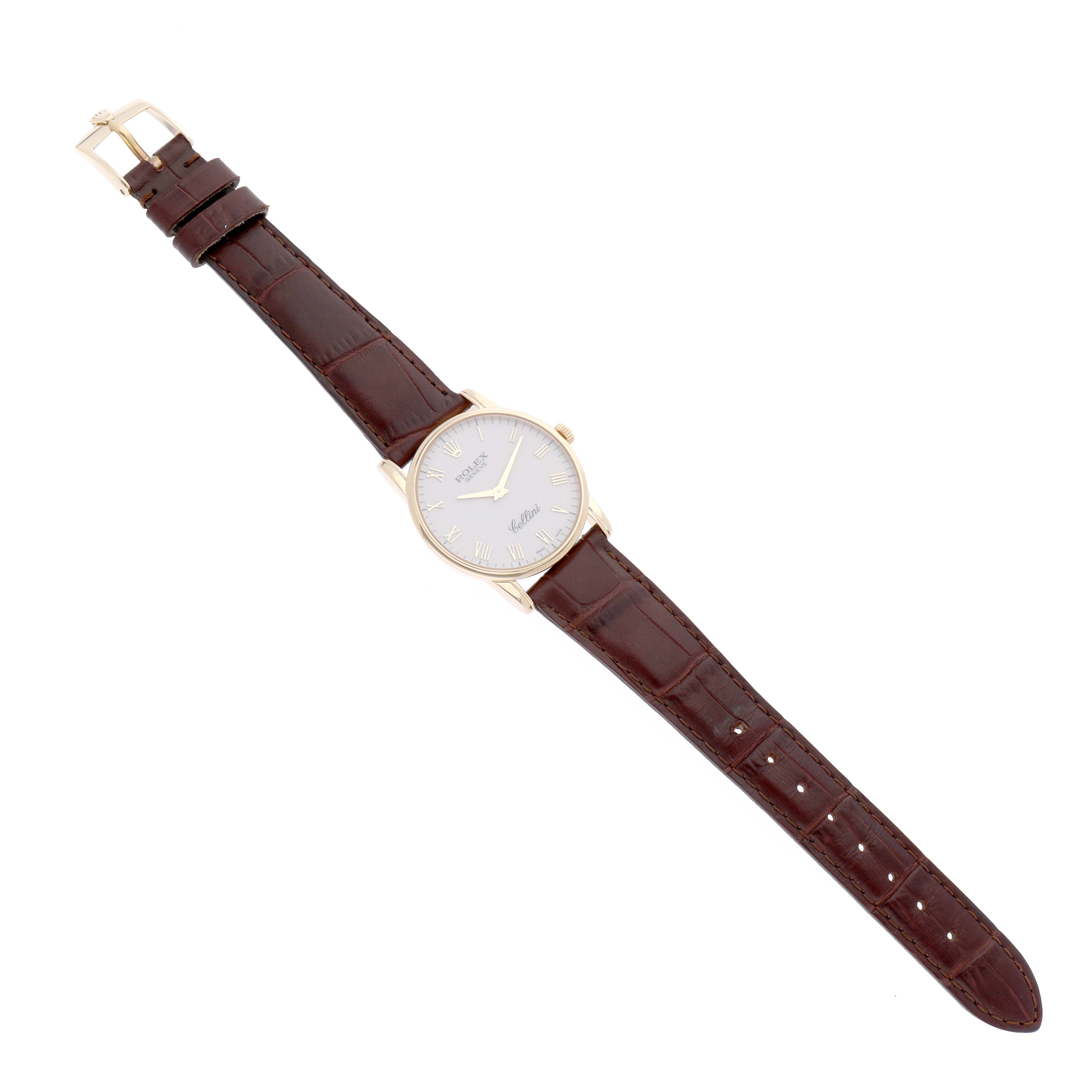 The Rolex Cellini 5116/8 Men's Yellow Gold White Dial 5116/8 Men's Yellow Gold White Dial watch is shown from a top-down angle, showcasing its face, crown, and leather strap.