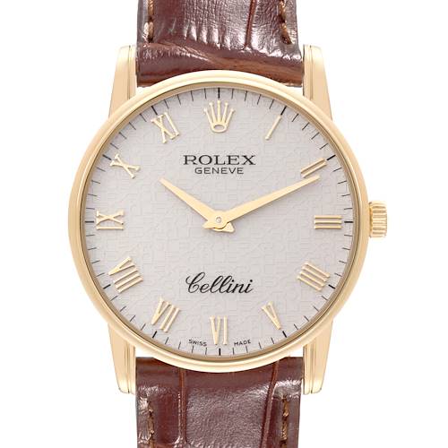 The image shows the front view of a Rolex Cellini watch, highlighting its dial, Roman numerals, and leather strap.