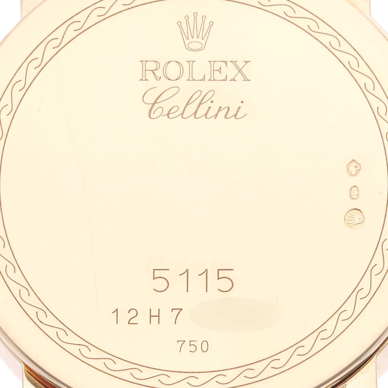 The image shows the back case of a Rolex Cellini 5115 Men's Yellow Gold Mother of Pearl Dial 5115 Men's Yellow Gold Mother of Pearl Dial model, displaying the branding, model number 5115, and hallmark stamps.
