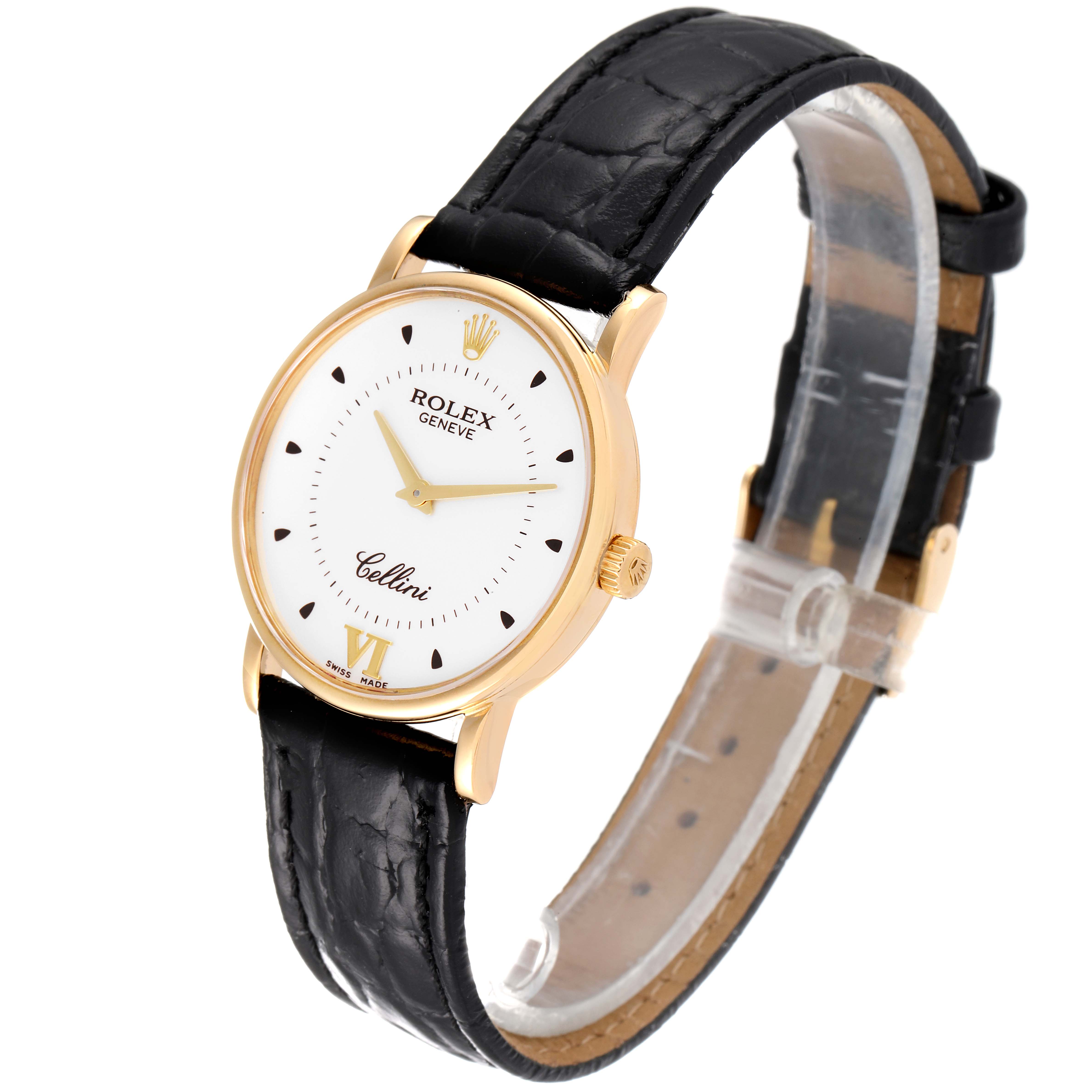 The Rolex Cellini 5115 Men's Yellow Gold Silver Dial 5115 Men's Yellow Gold Silver Dial watch is shown at a slight angle highlighting the gold case, white dial, black leather strap, and crown.