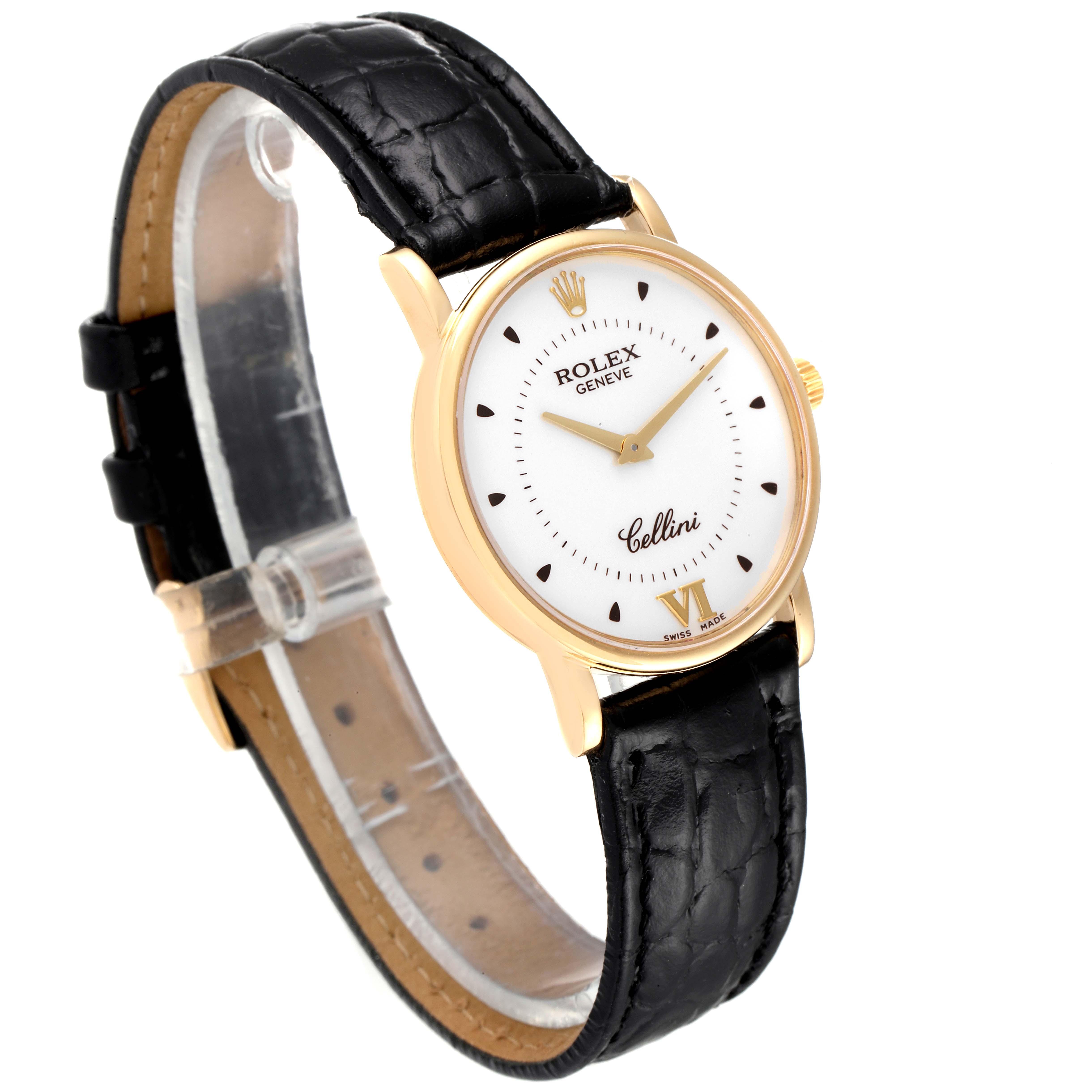 The Rolex Cellini 5115 Men's Yellow Gold Silver Dial 5115 Men's Yellow Gold Silver Dial watch is shown at a three-quarter angle, displaying its dial, gold case, and black leather strap.