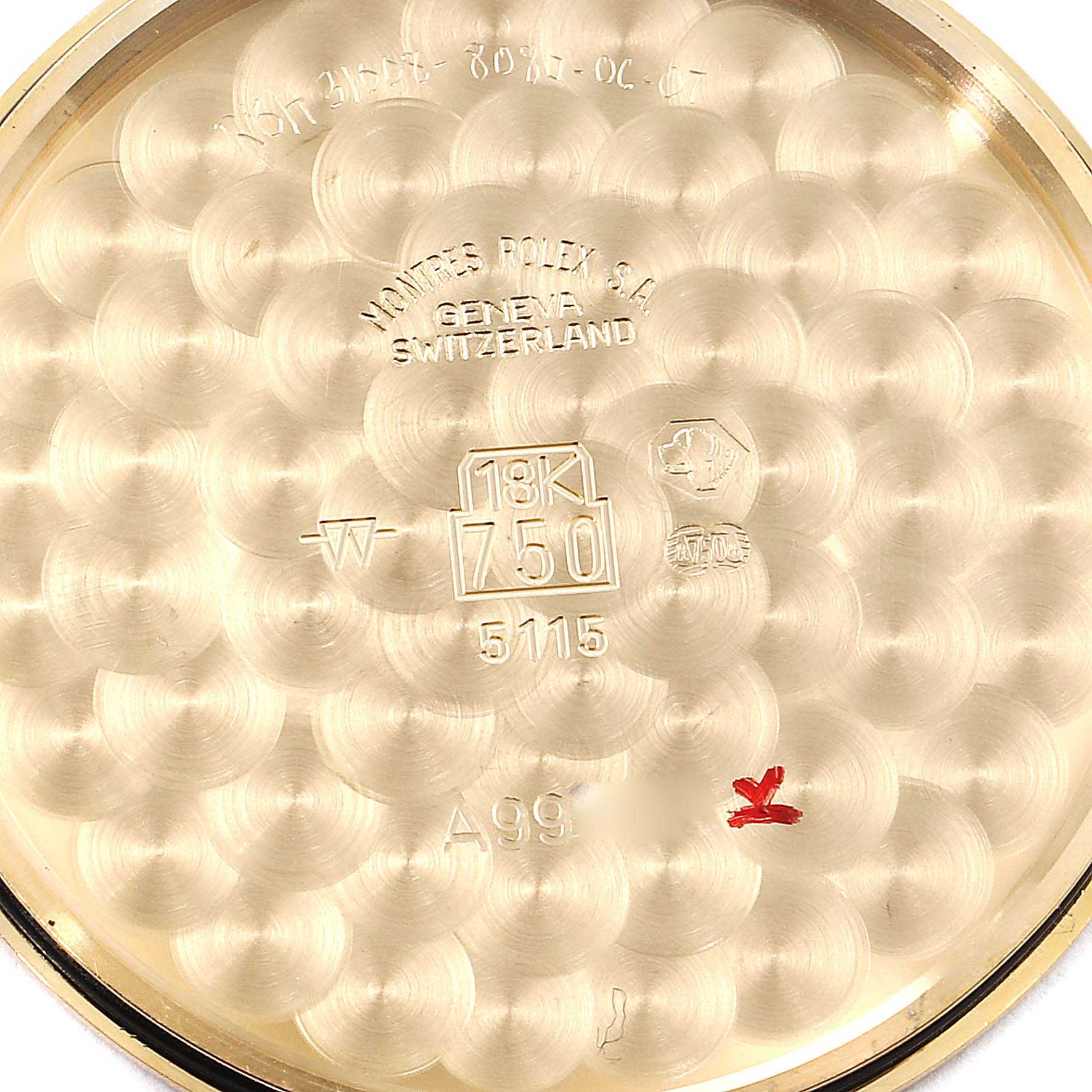 The image shows the interior case back of a Rolex Cellini 5115 Men's Yellow Gold Silver Dial 5115 Men's Yellow Gold Silver Dial model, featuring engravings and gold hallmarks.