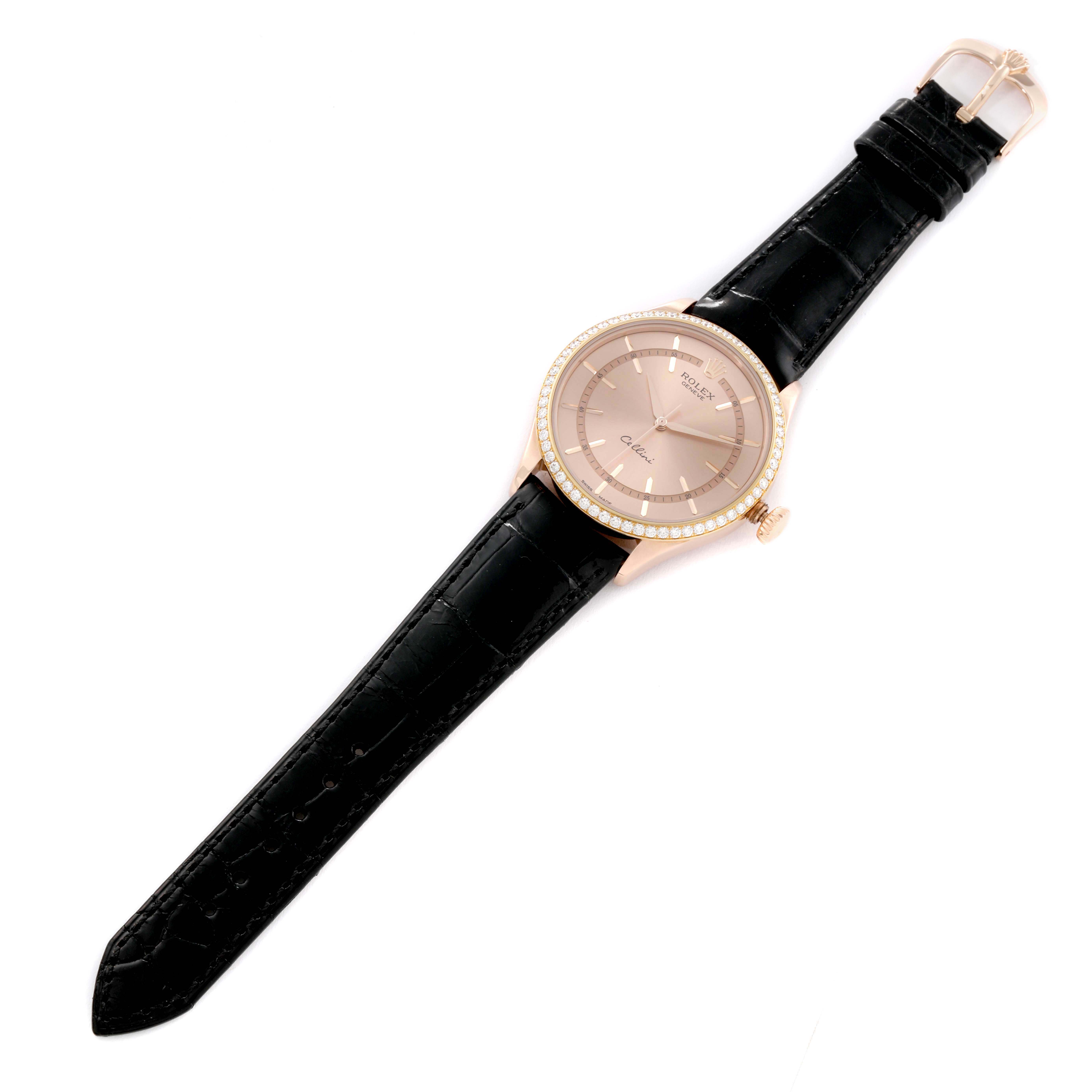 This Rolex Cellini 50705 Men's Rose Gold Pink Dial 50705 Men's Rose Gold Pink Dial watch is shown from a top-down angle, highlighting its face, bezel, crown, and black leather strap.