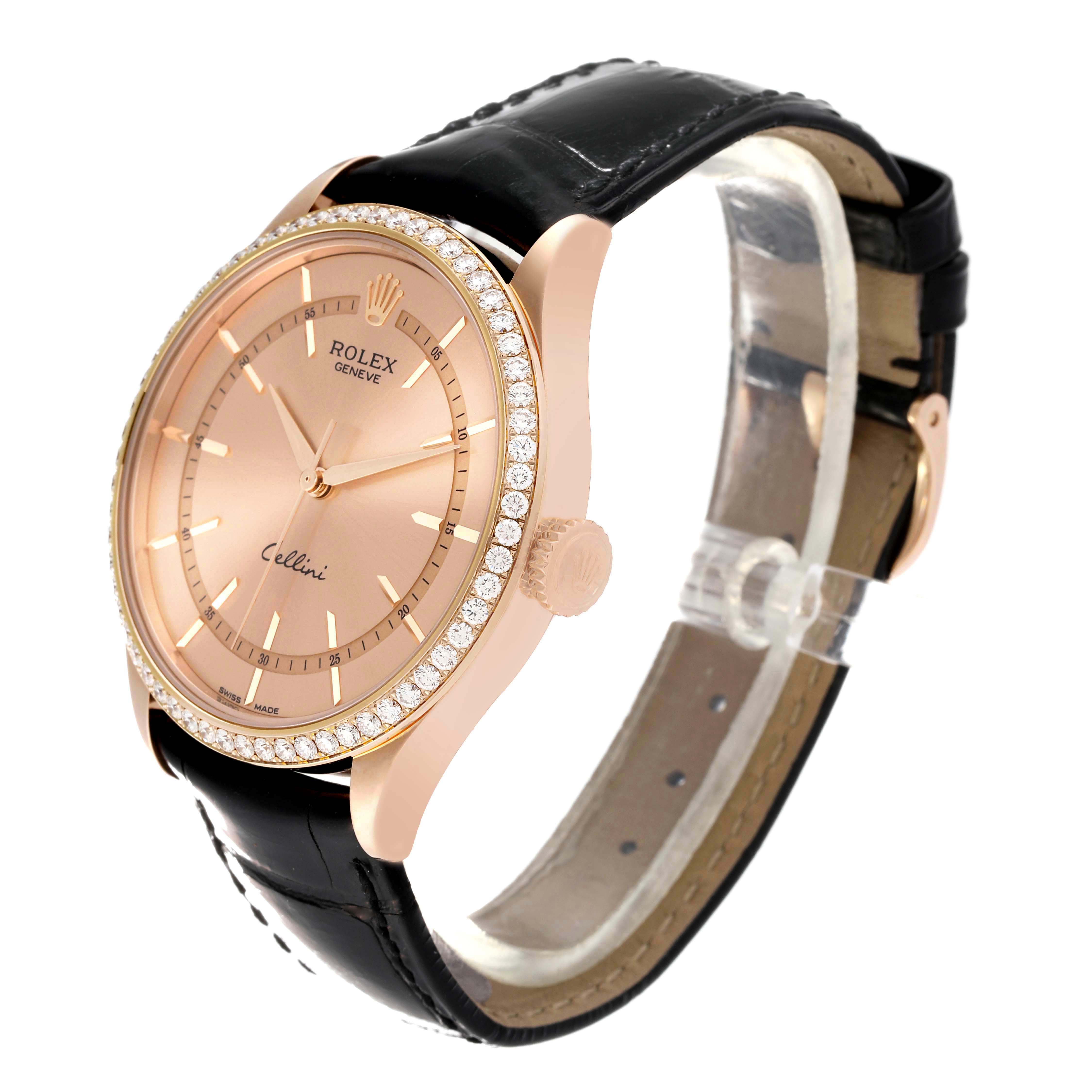The image shows a side view of a Rolex Cellini 50705 Men's Rose Gold Pink Dial 50705 Men's Rose Gold Pink Dial watch with a rose gold case, diamond bezel, and black leather strap.