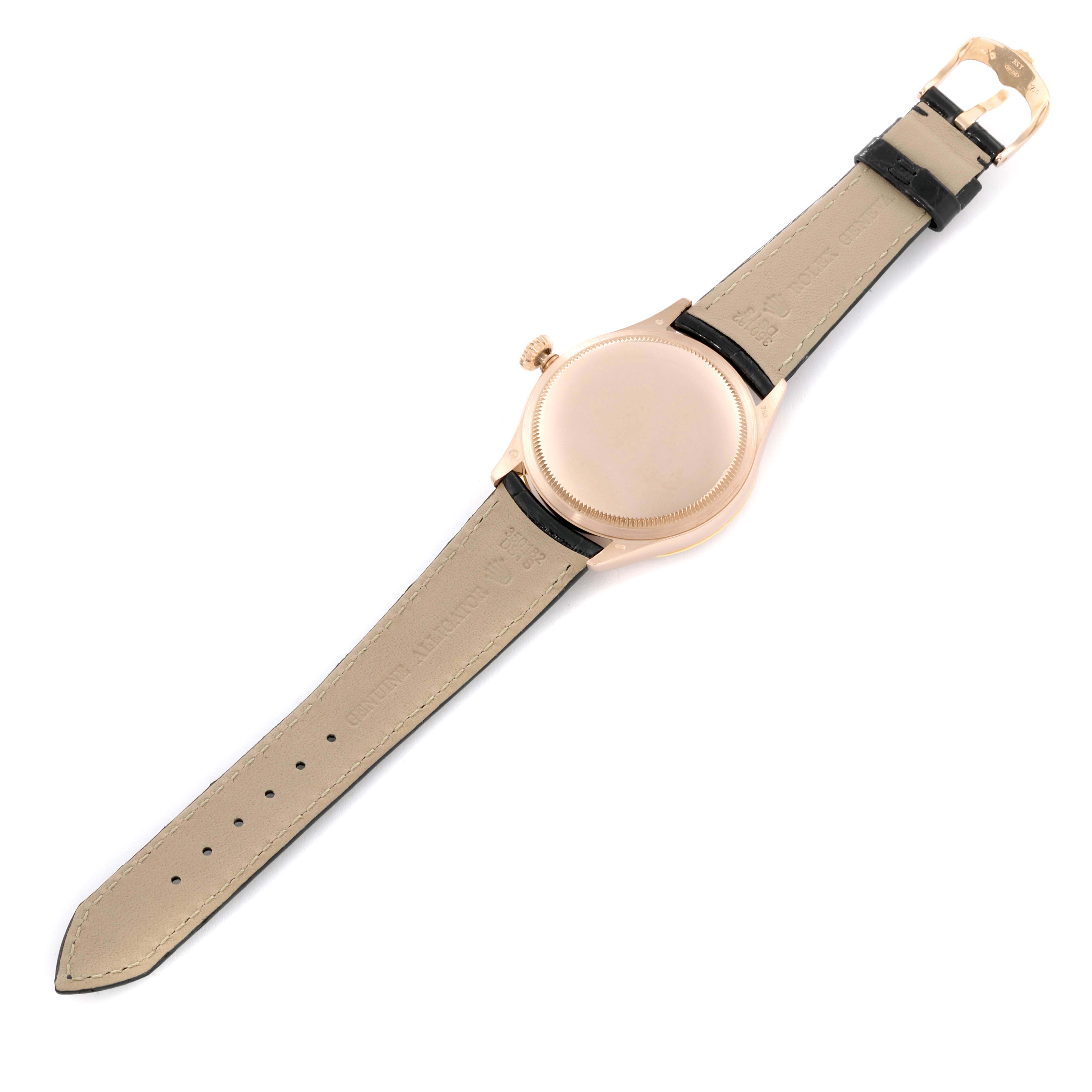 The image shows the back view of a Rolex Cellini 50705 Men's Rose Gold Pink Dial 50705 Men's Rose Gold Pink Dial watch, highlighting the leather strap, case back, crown, and buckle.