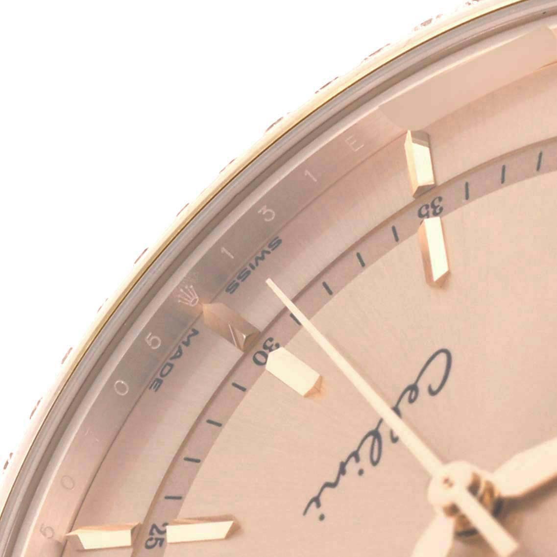 This image shows a close-up angle of the dial and hands of a Rolex Cellini 50705 Men's Rose Gold Pink Dial 50705 Men's Rose Gold Pink Dial watch, focusing on the hour markers and a portion of the bezel.
