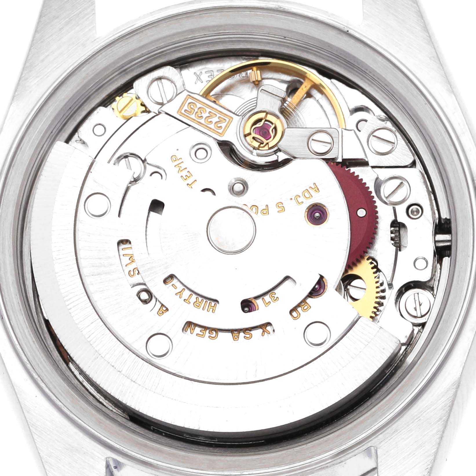 This is a close-up view of the internal mechanics of a Rolex Date 79160 Women's Stainless Steel Pink Dial 79160 Women's Stainless Steel Pink Dial model watch, showcasing its movement components.