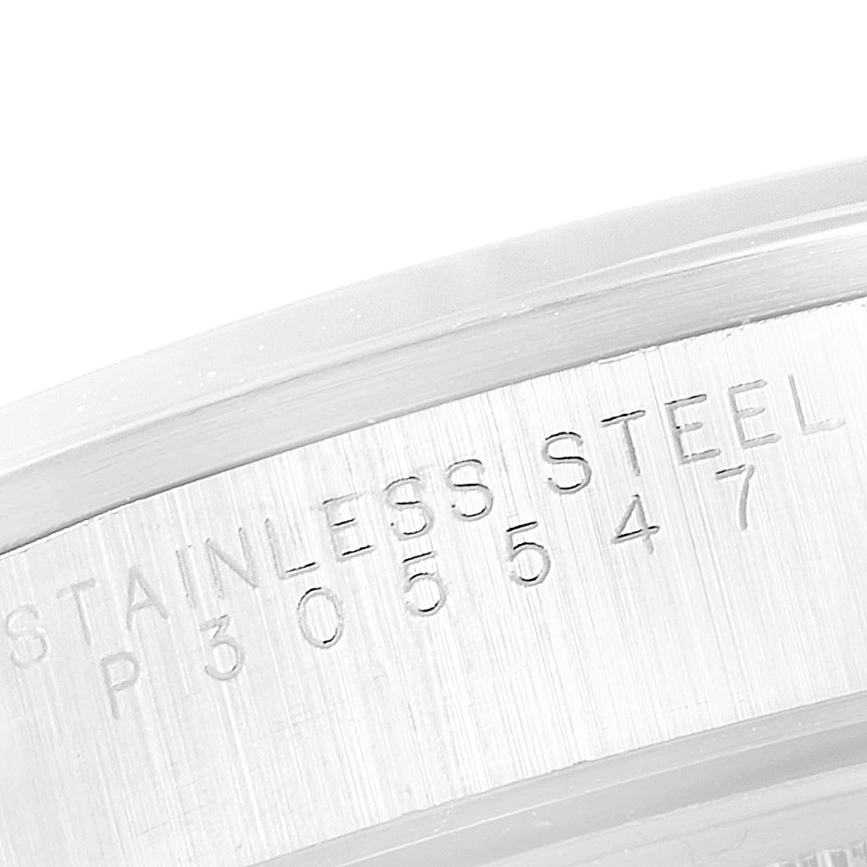 The image shows a close-up angle of the case back of a Rolex Date 15200 Men's Stainless Steel White Dial 15200 Men's Stainless Steel White Dial model, highlighting the stainless steel engraving.