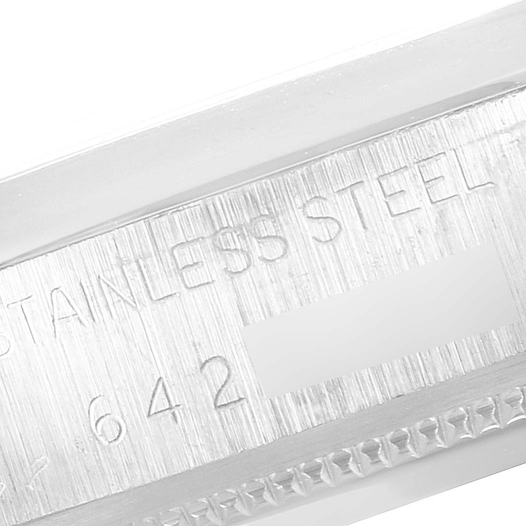 This close-up shows the engraved details on the side of the Rolex Vintage Collection 1500 Men's Stainless Steel Brown Dial 1500 Men's Stainless Steel Brown Dial watch.