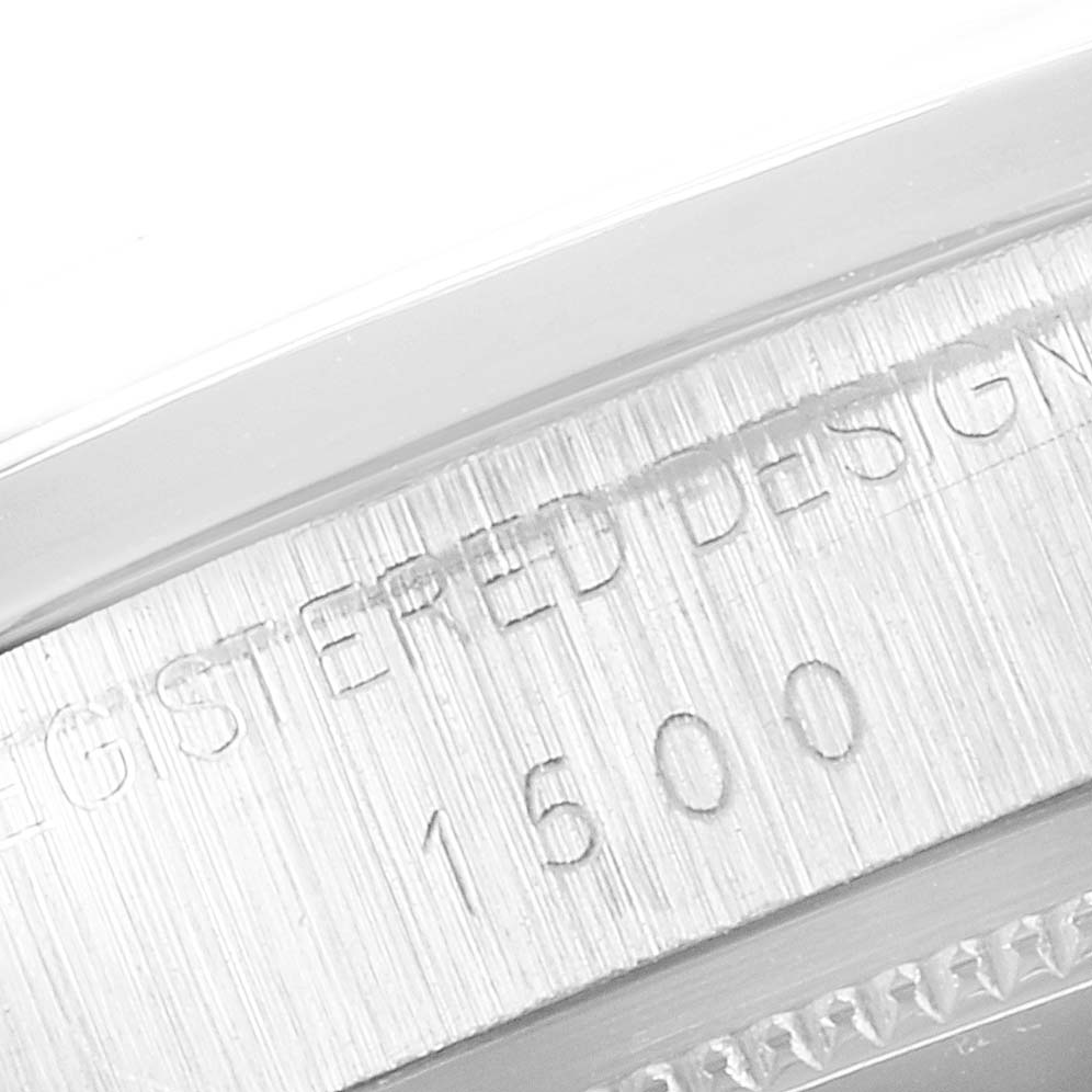 This image shows a close-up of the case side and serial number 1500 on the Rolex Vintage Collection 1500 Men's Stainless Steel Brown Dial 1500 Men's Stainless Steel Brown Dial model.