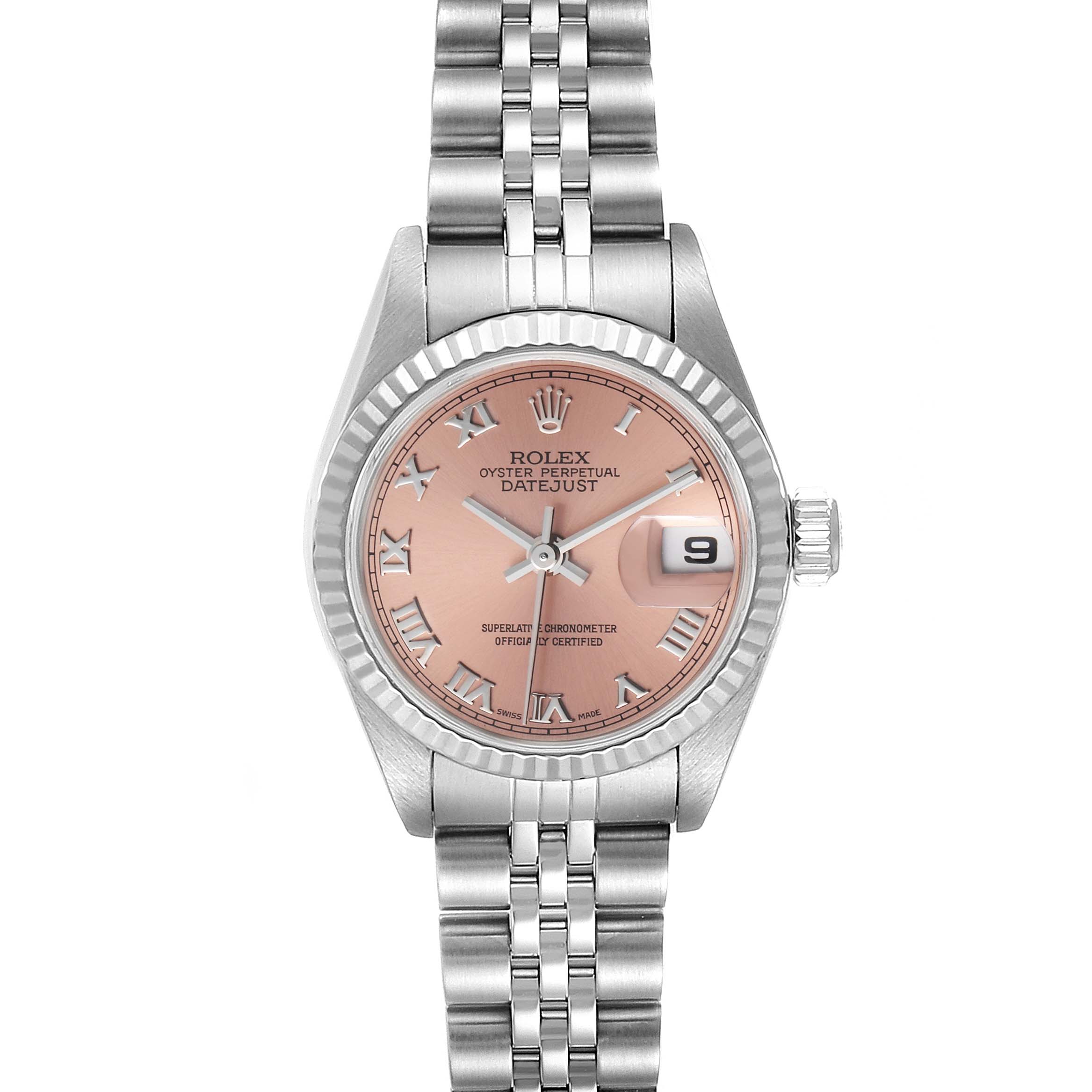 The image displays a Rolex Datejust 79174 Women's Stainless Steel Pink Dial 79174 Women's Stainless Steel Pink Dial watch front-facing, showing the pink dial, fluted bezel, and Jubilee bracelet.