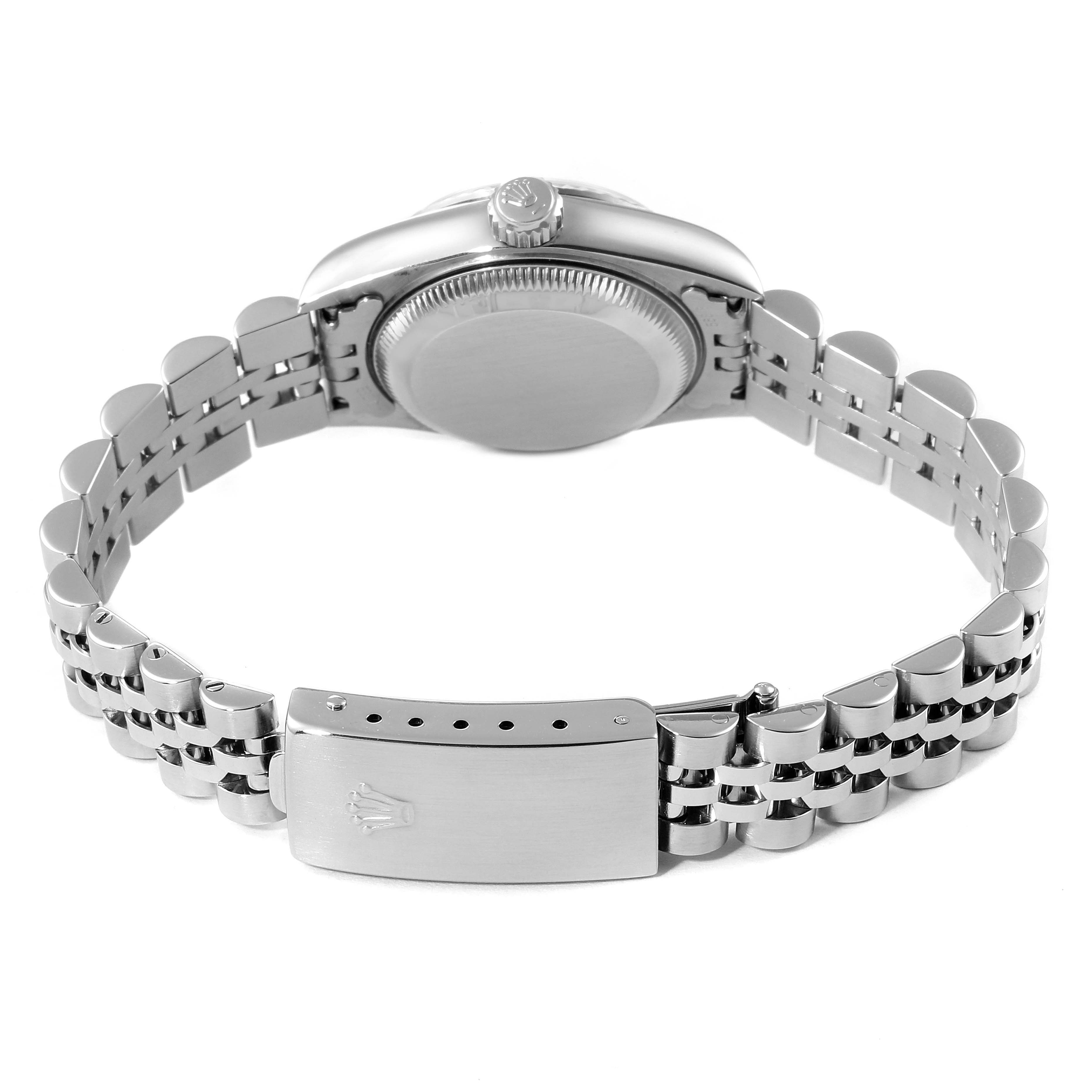 The image shows the back case, crown, and bracelet clasp of a Rolex Datejust 79174 Women's Stainless Steel Pink Dial 79174 Women's Stainless Steel Pink Dial watch from a rear angle.