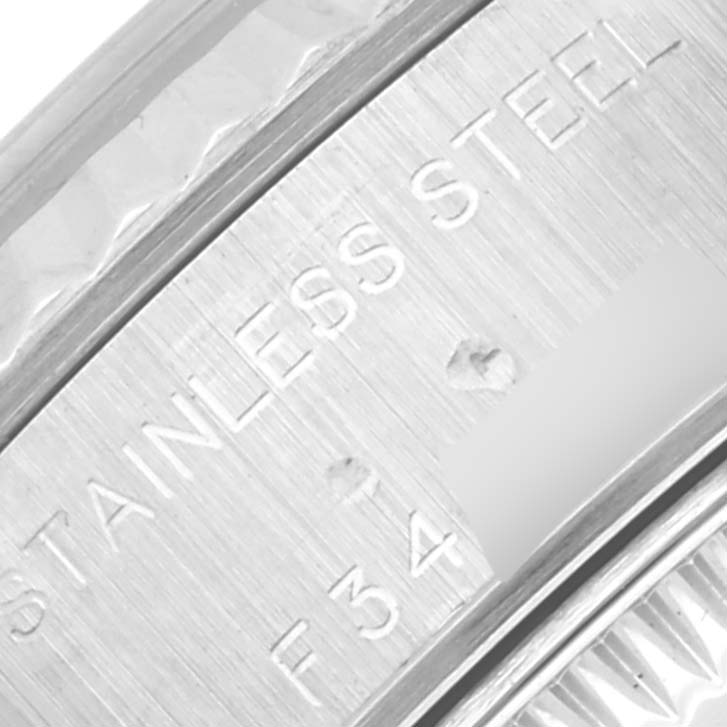 This image shows a close-up of the stainless steel engraving on the casing of a Rolex Datejust 79174 Women
s Stainless Steel Silver Dial 79174 Women
s Stainless Steel Silver Dial watch.