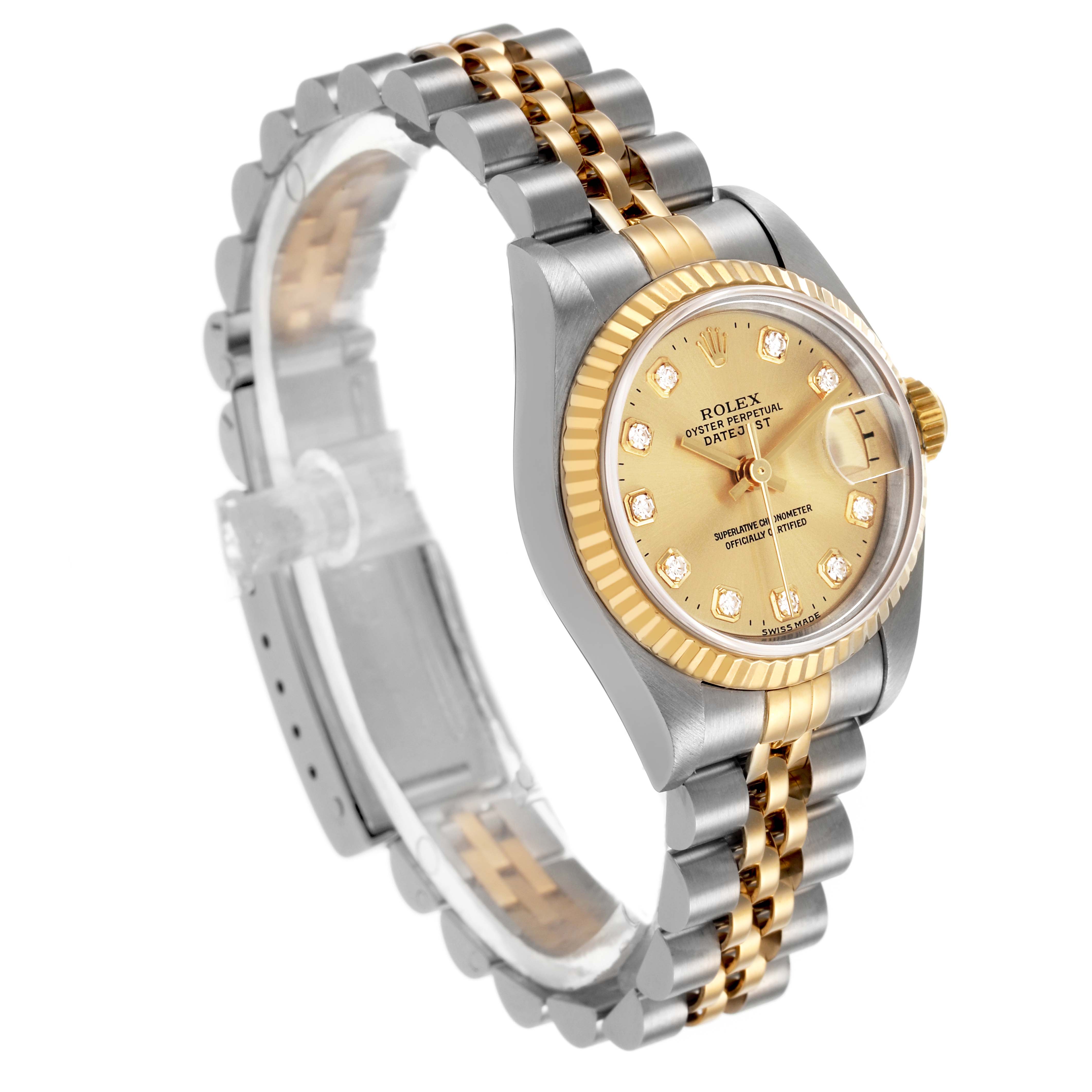 The Rolex Datejust 69173 Women's Stainless Steel Champagne Dial watch is shown from an angle displaying the gold dial, fluted bezel, and two-tone Jubilee bracelet.