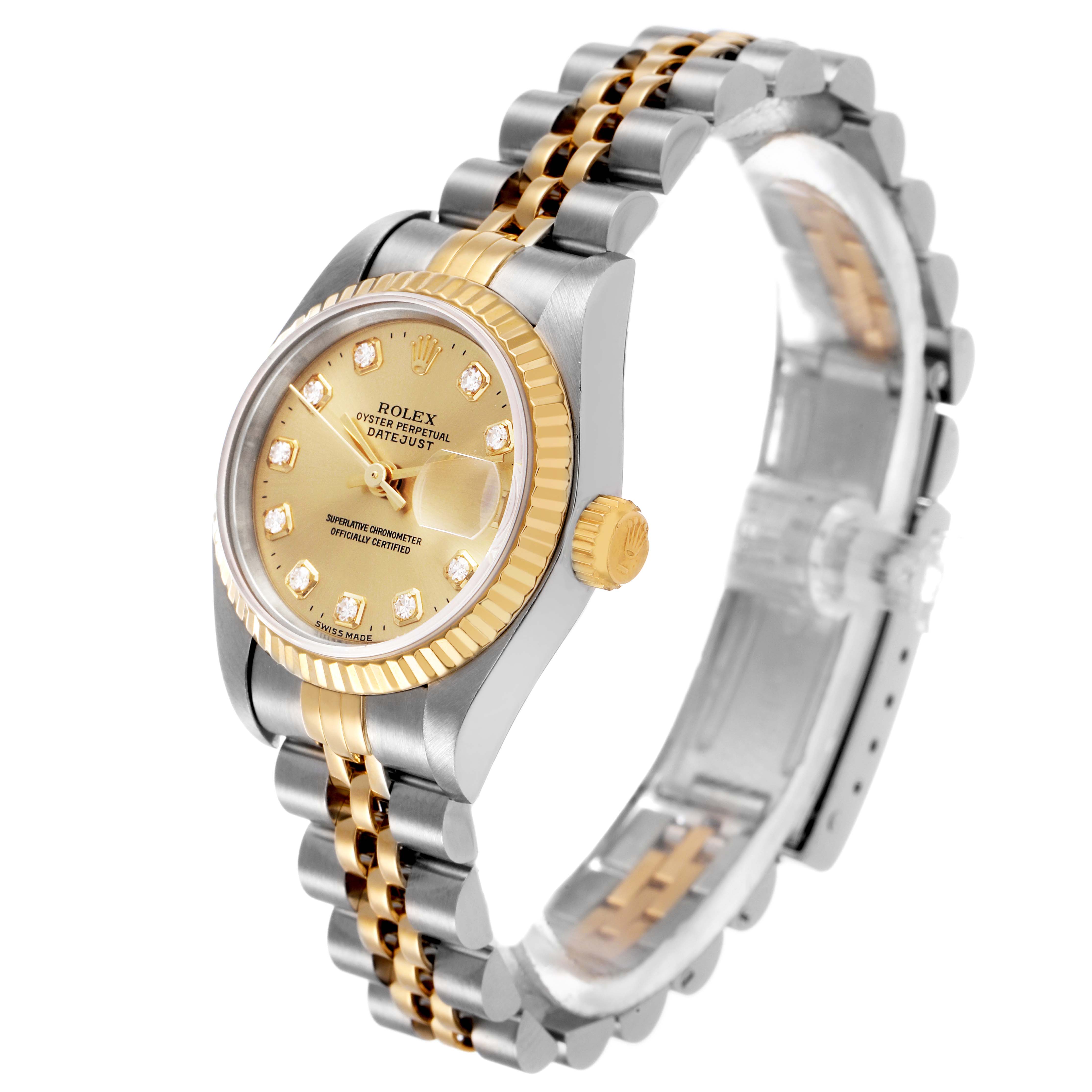The Rolex Datejust 69173 Women's Stainless Steel Champagne Dial watch is shown at a three-quarter angle, highlighting the dial, bezel, and bracelet.