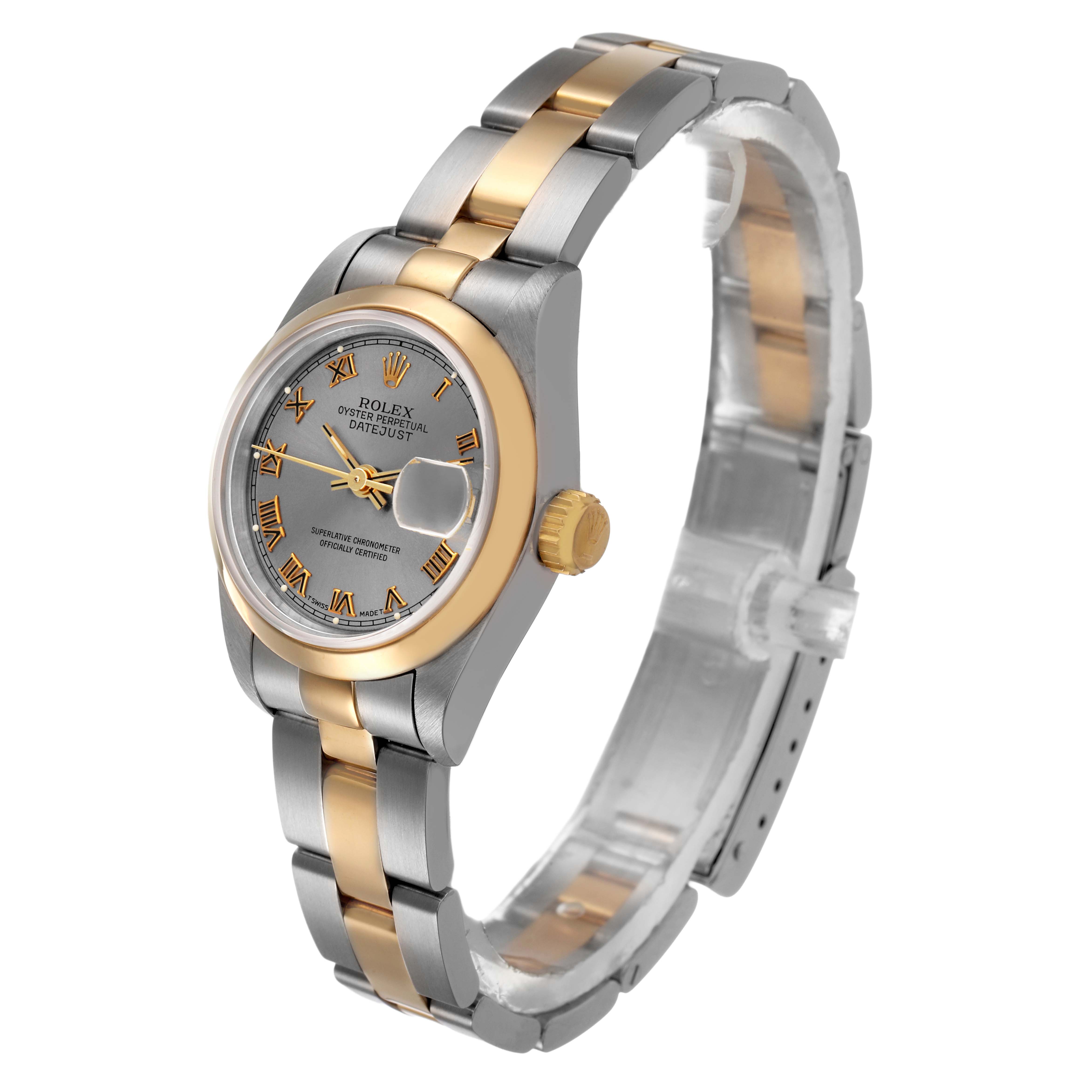 The Rolex Datejust 79163 Women's Steel and Gold (two tone) Grey Dial watch is shown at a three-quarter angle, highlighting the dial, bezel, crown, and bracelet.