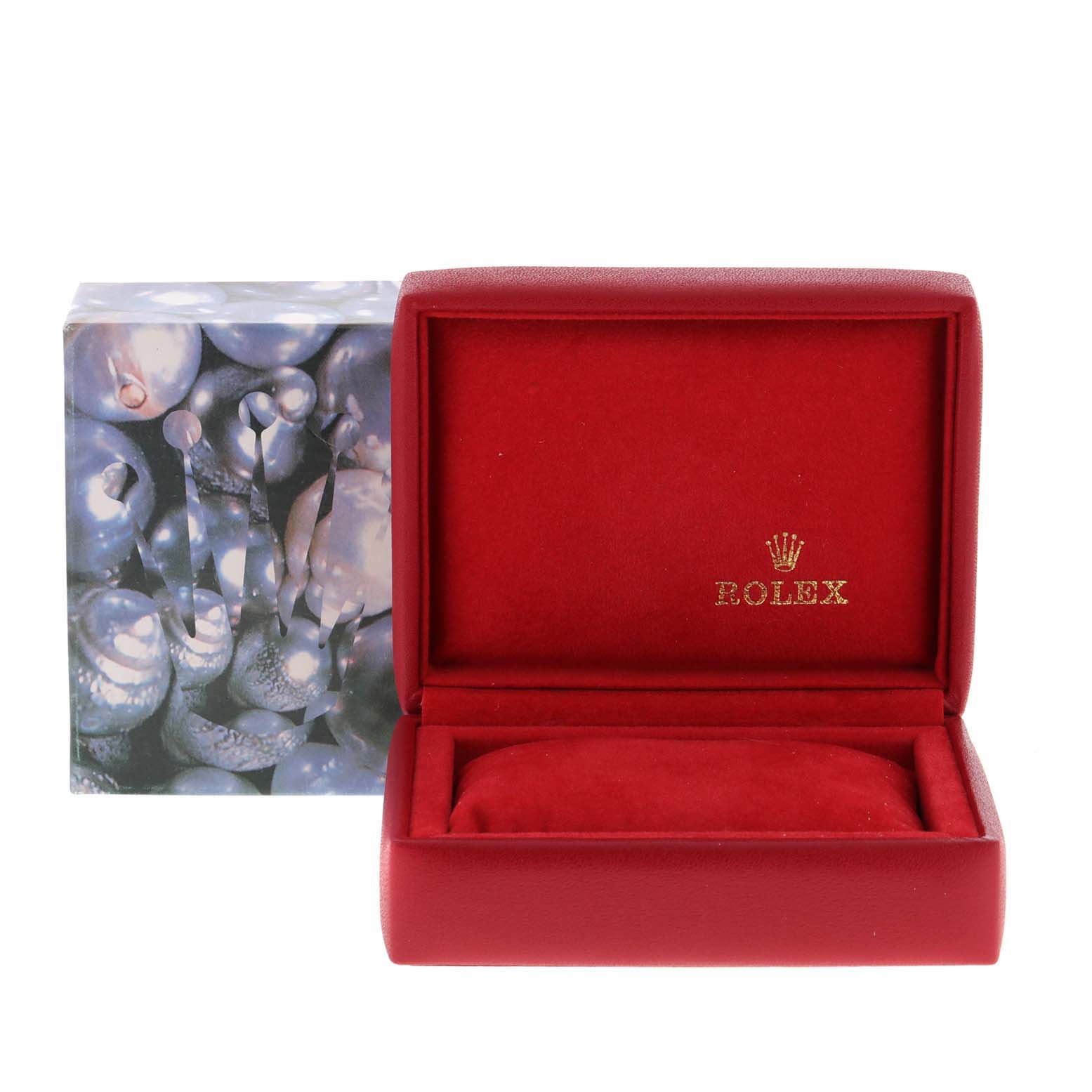 The image shows an empty Rolex Datejust 69173 Women
s Steel and Gold (two tone) Champagne Dial 69173 Women
s Steel and Gold (two tone) Champagne Dial watch box with a red interior and a decorative outer box, viewed from the front.