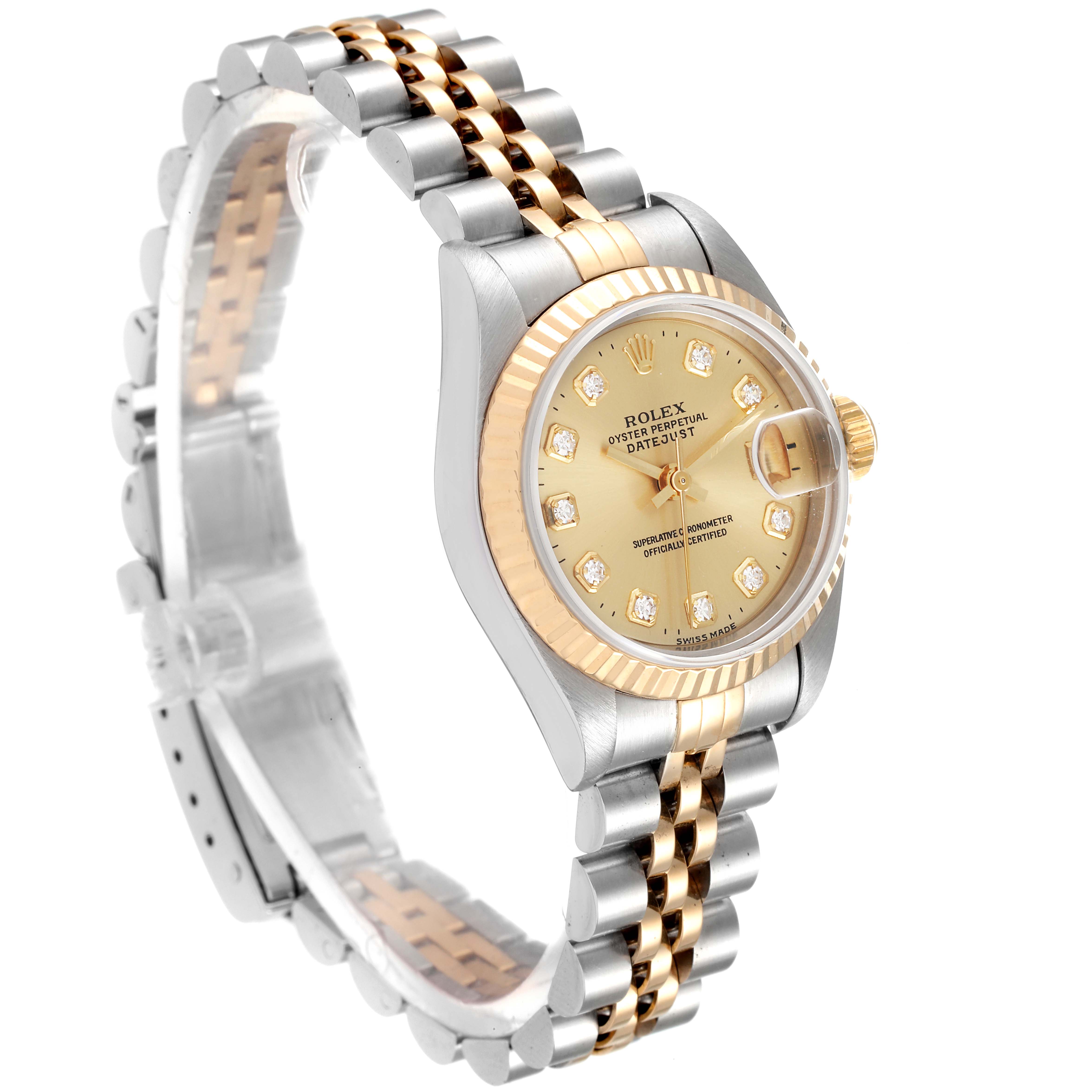 The Rolex Datejust 69173 Women
s Steel and Gold (two tone) Champagne Dial 69173 Women
s Steel and Gold (two tone) Champagne Dial watch is shown from a three-quarter front angle, displaying its face, bezel, crown, and part of the bracelet.
