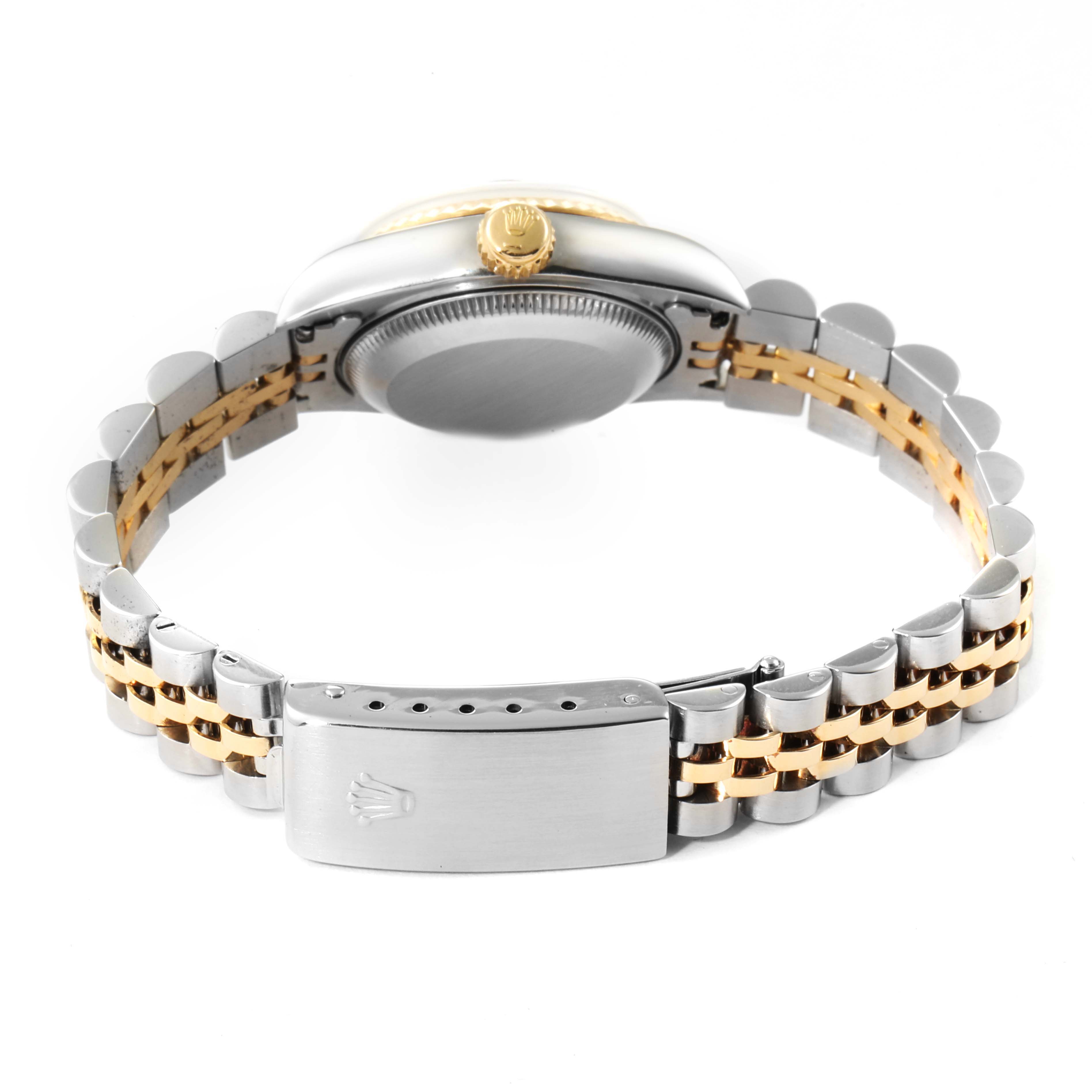 The image shows the rear view of a Rolex Datejust 69173 Women
s Steel and Gold (two tone) Champagne Dial 69173 Women
s Steel and Gold (two tone) Champagne Dial watch, highlighting its two-tone bracelet, clasp, and crown.
