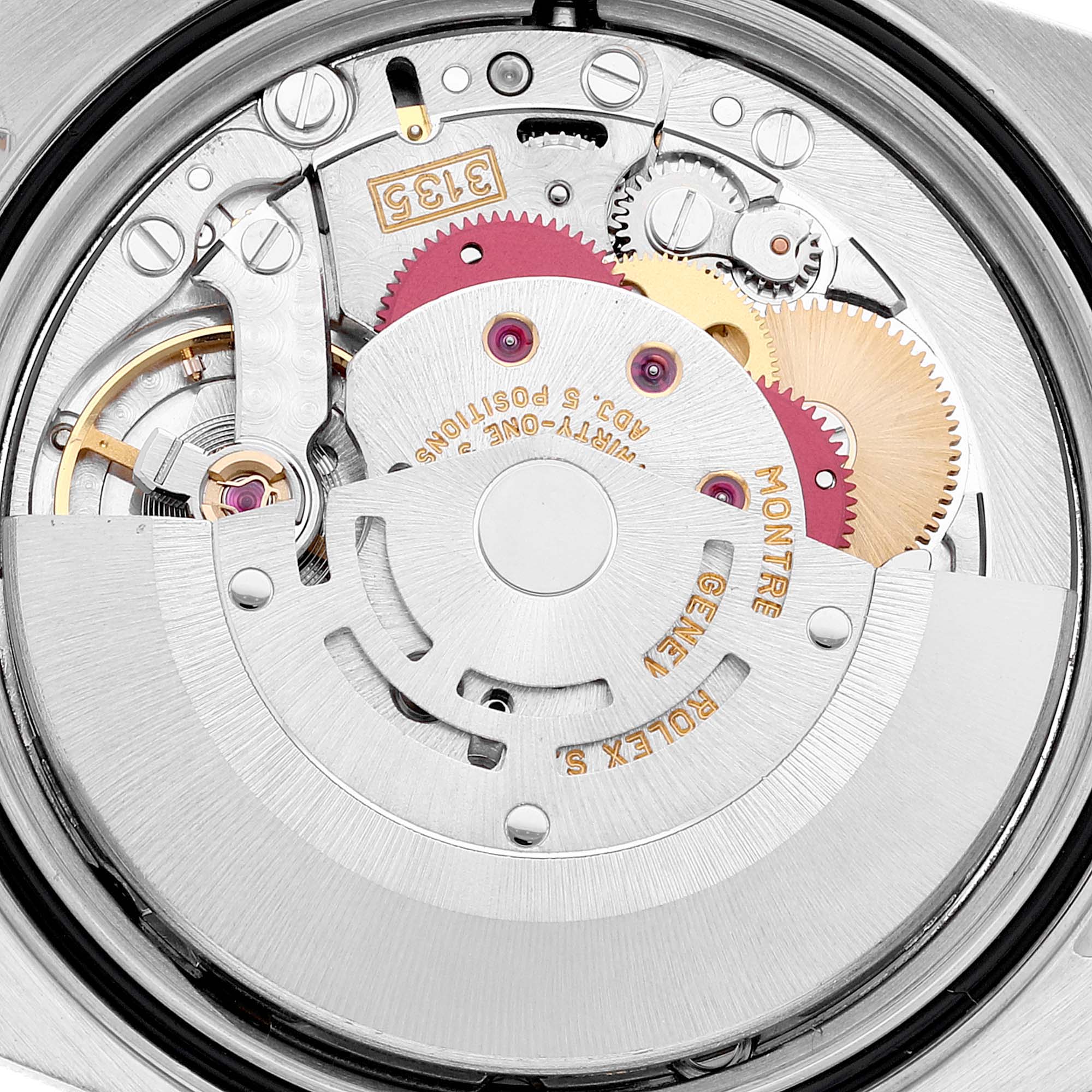 This image shows the intricate internal mechanism and rotor of a Rolex Datejust 16233 Men's Steel and Gold (two tone) Blue Dial 16233 Men's Steel and Gold (two tone) Blue Dial watch from a close-up angle.
