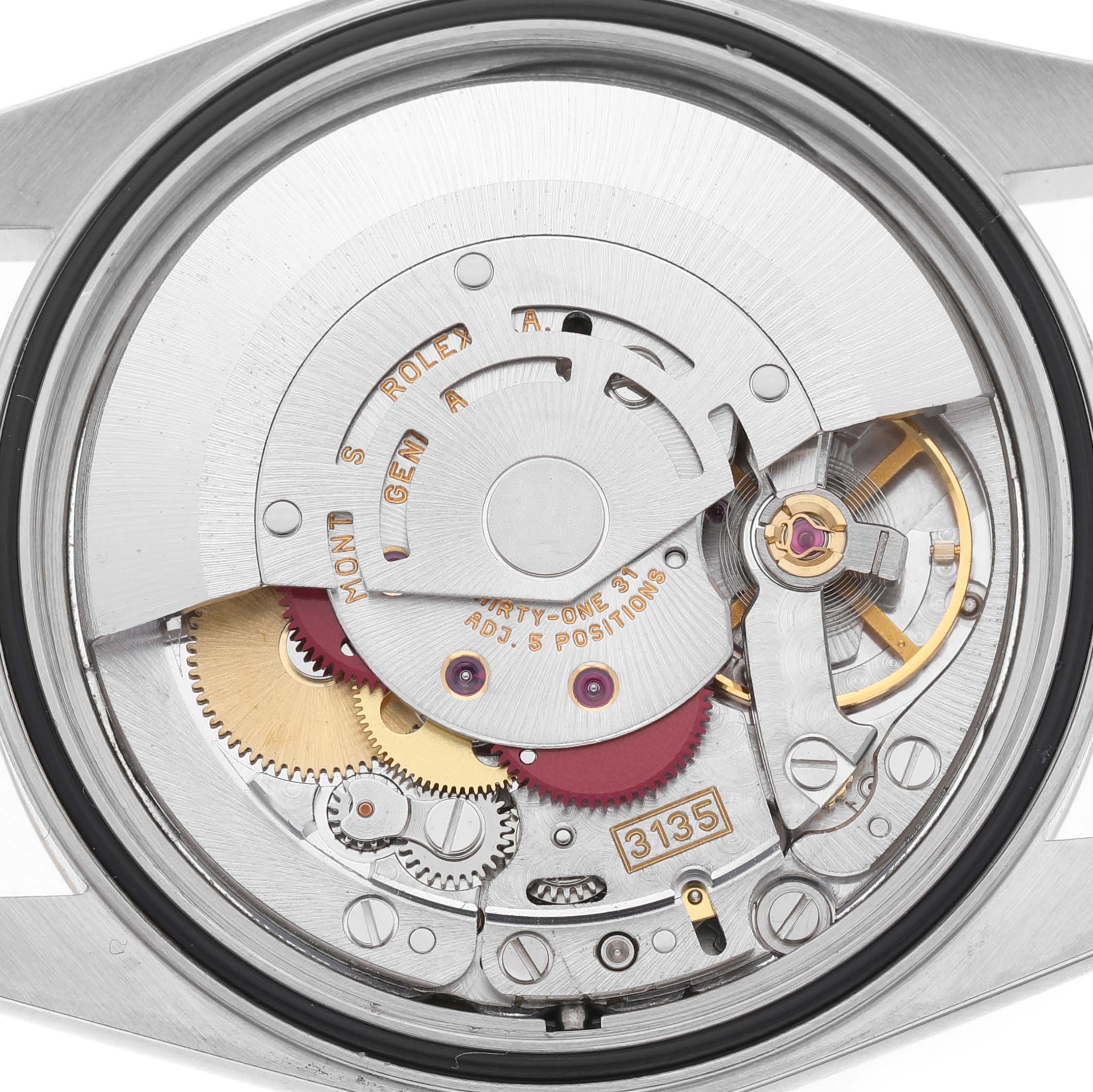 The image shows the movement of a Rolex Datejust 16233 Men's Stainless Steel Blue Dial, highlighting gears and the balance wheel from the back angle.