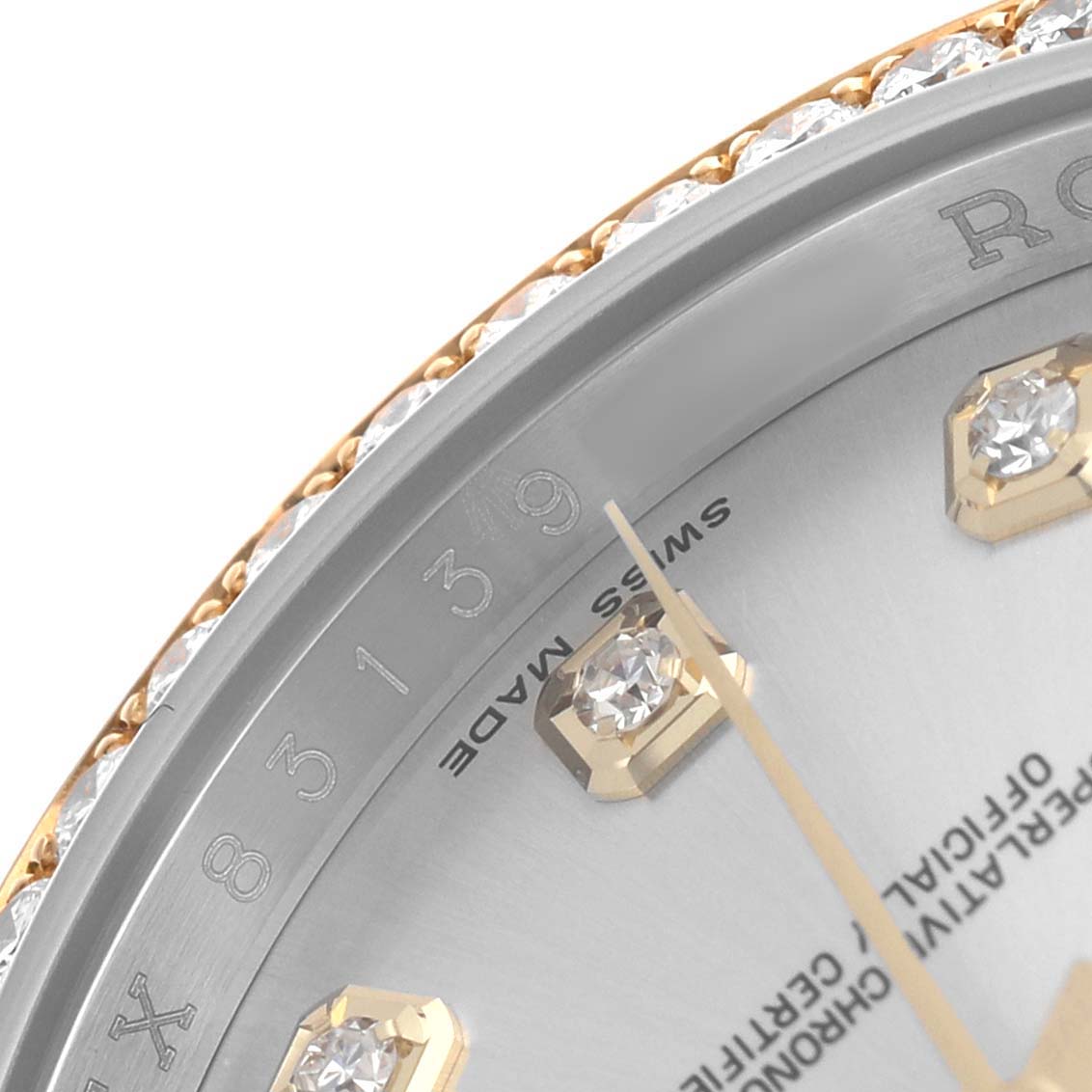 The image shows a close-up of the dial and bezel with diamonds of a Rolex Datejust 116243 Men's Stainless Steel Silver Dial watch, highlighting hour markers.