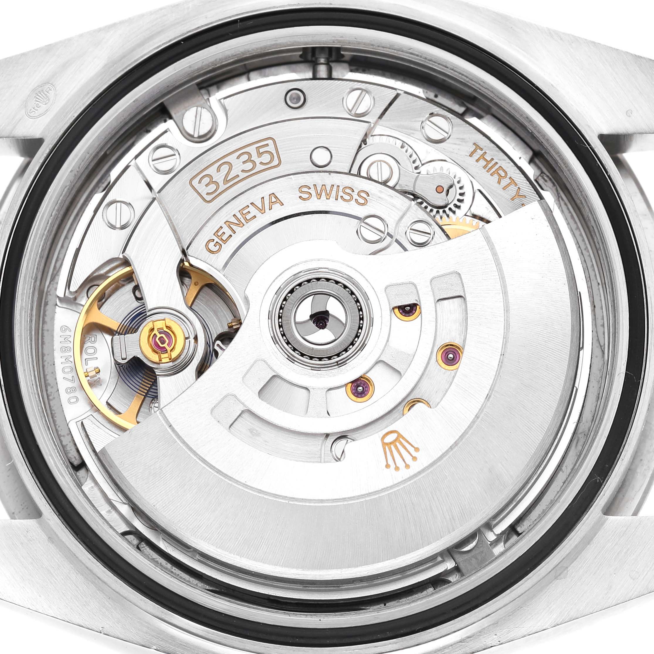 The image shows the movement and internal mechanics of the Rolex Datejust 41 126334 Men's Stainless Steel Blue Dial watch, specifically the caliber 3235.