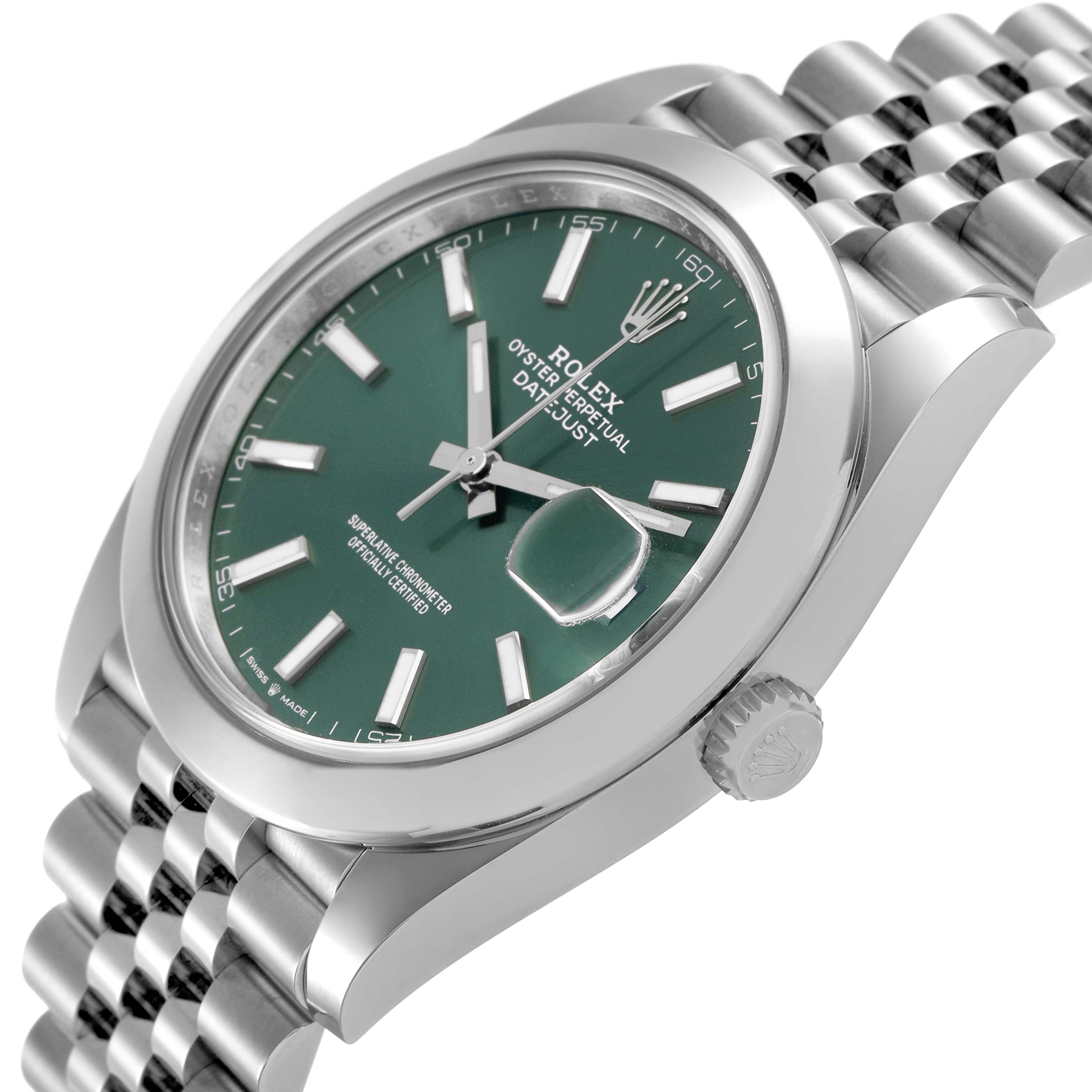 The Rolex Datejust 41 126300 Men's Stainless Steel Green Dial is shown at an angle highlighting the dial, case, crown, and Jubilee bracelet with a green face.