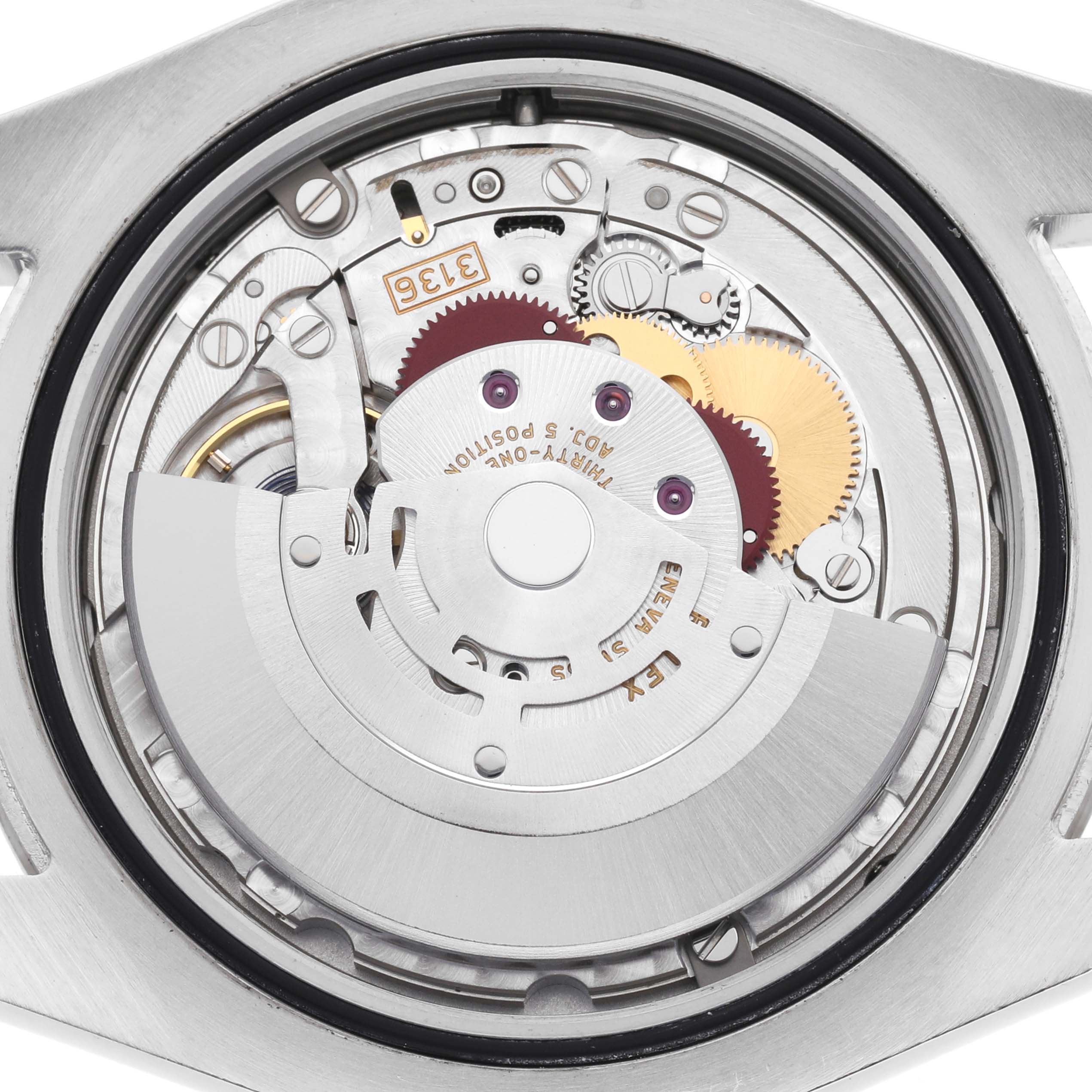 The image shows the movement mechanism of the Rolex Datejust 41, model number 116334, viewed from the back, highlighting gears and internal components.