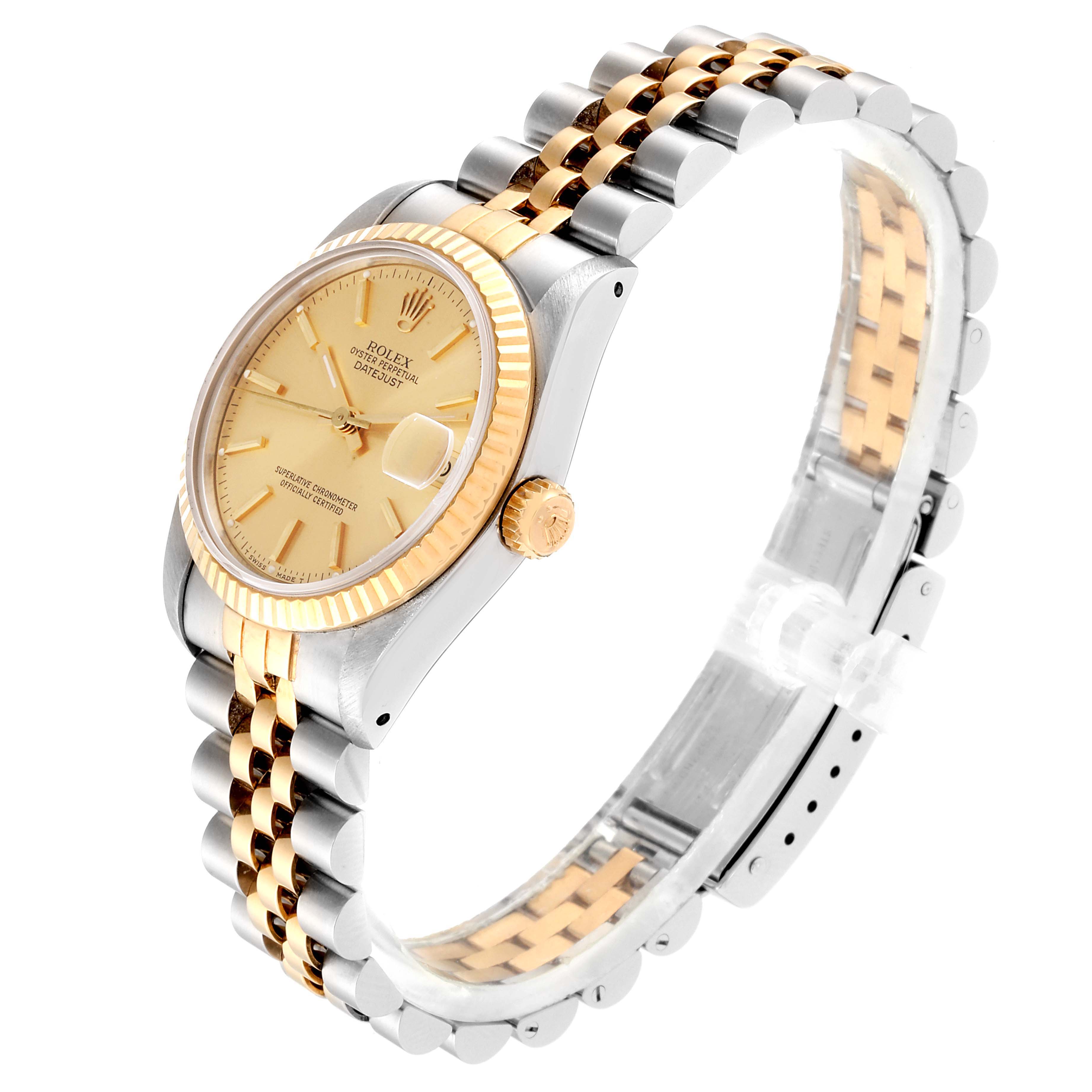 The image shows a side angle view of the Rolex Mid-Size 68273 Women
s Steel and Gold (two tone) Champagne Dial 68273 Women
s Steel and Gold (two tone) Champagne Dial watch, displaying its gold bezel, dial, crown, and two-tone bracelet.