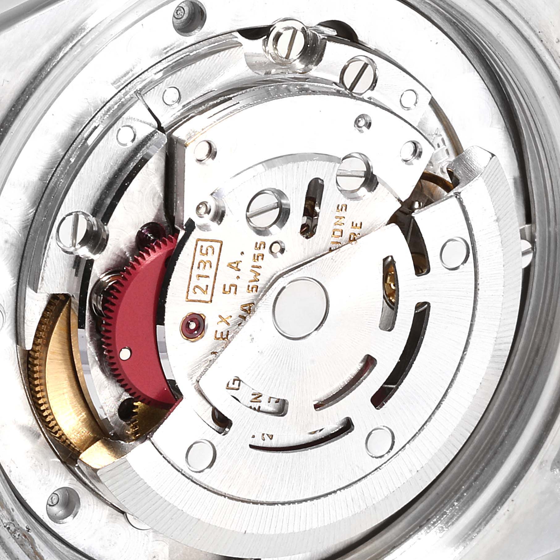 This image shows the movement mechanism of a Rolex Mid-Size 68273 Women
s Steel and Gold (two tone) Champagne Dial 68273 Women
s Steel and Gold (two tone) Champagne Dial model watch at a close-up angle.
